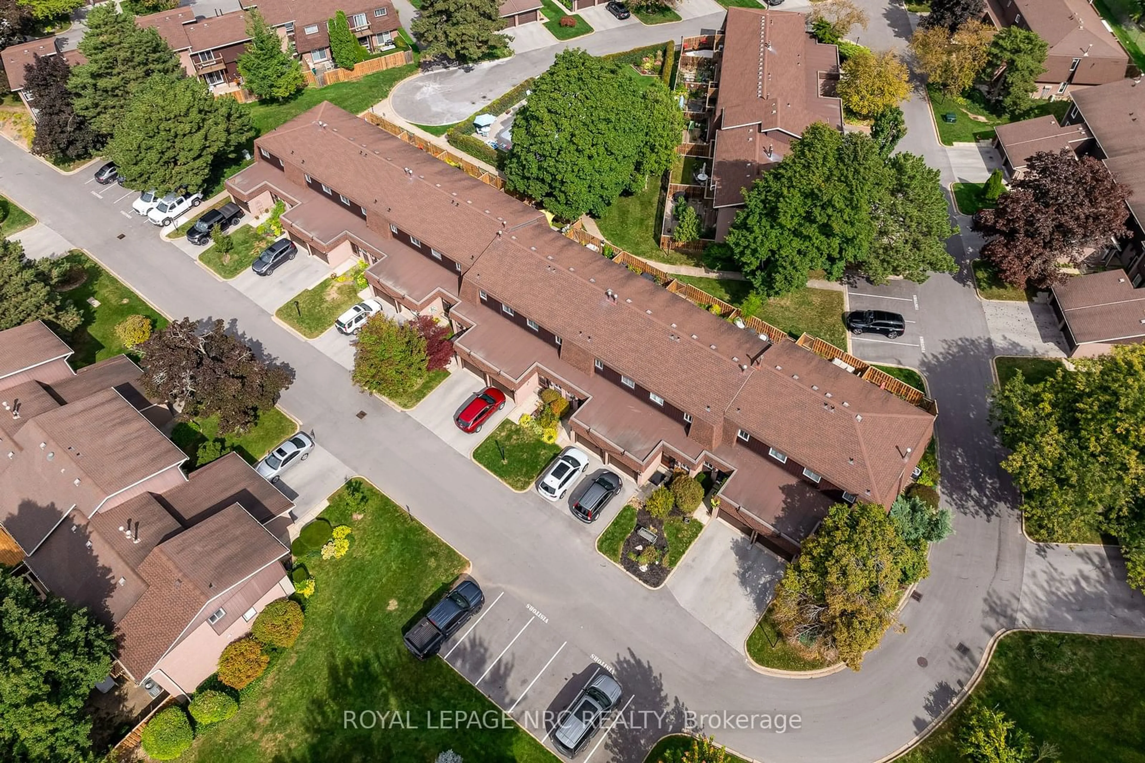 A pic from exterior of the house or condo, the street view for 122 Lakeshore Rd #34, St. Catharines Ontario L2N 6N6