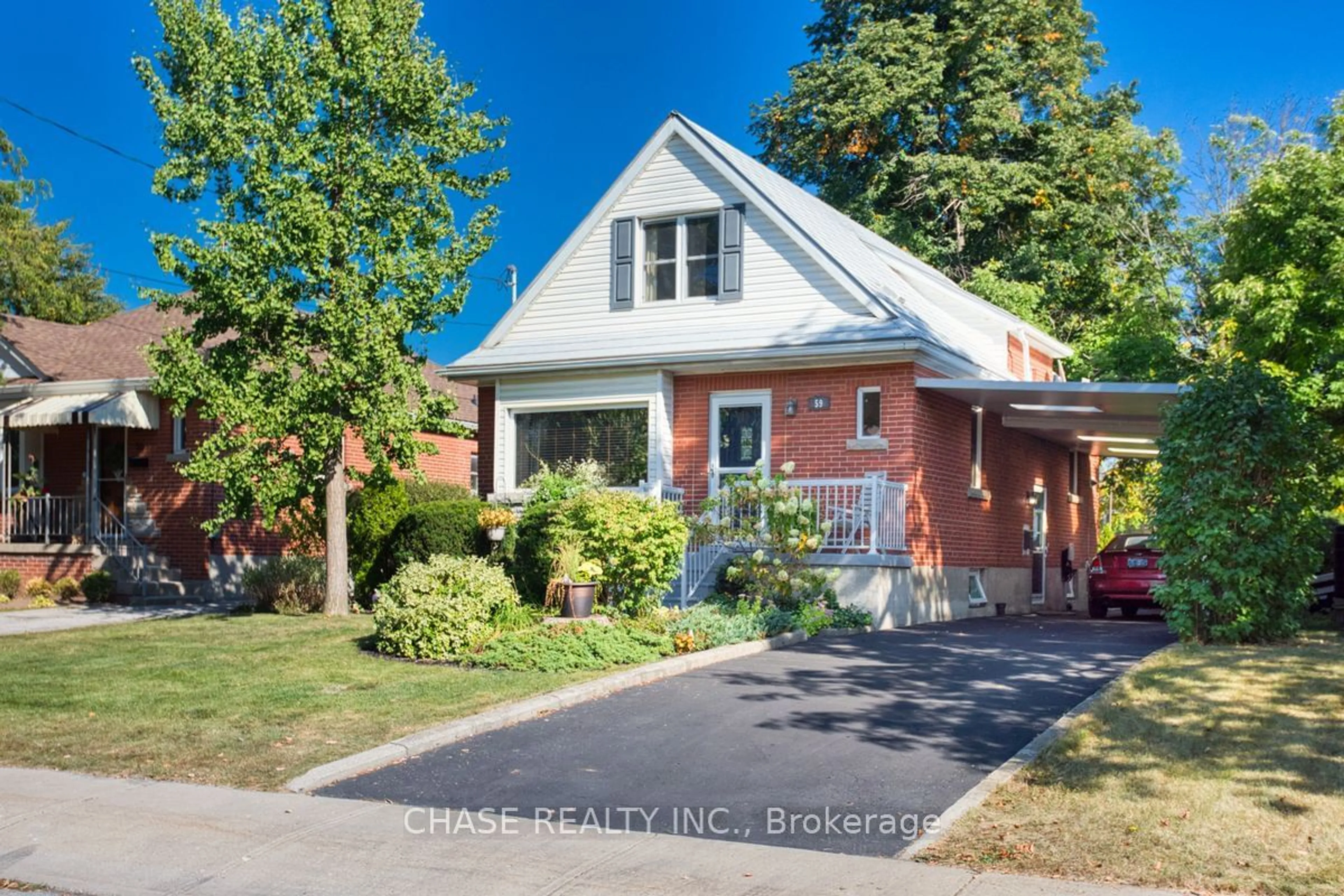 Frontside or backside of a home for 59 East 42nd St, Hamilton Ontario L8T 3A1