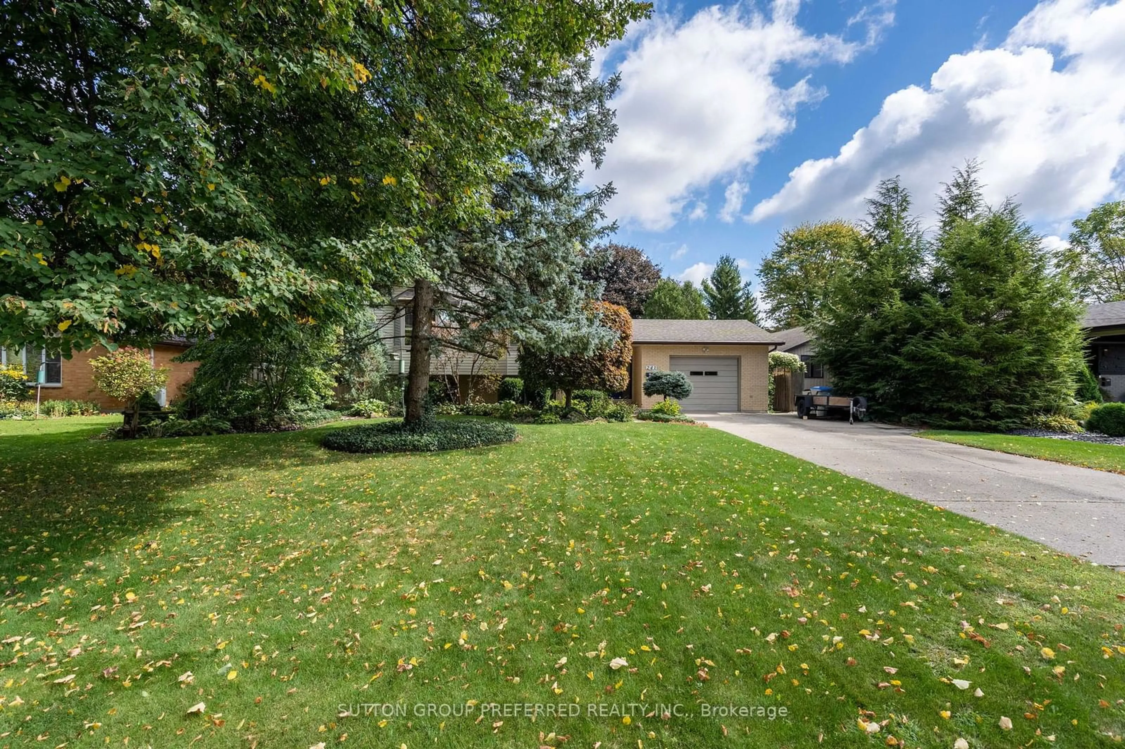 A pic from exterior of the house or condo, the fenced backyard for 241 Dominion St, Strathroy-Caradoc Ontario N7G 3G9