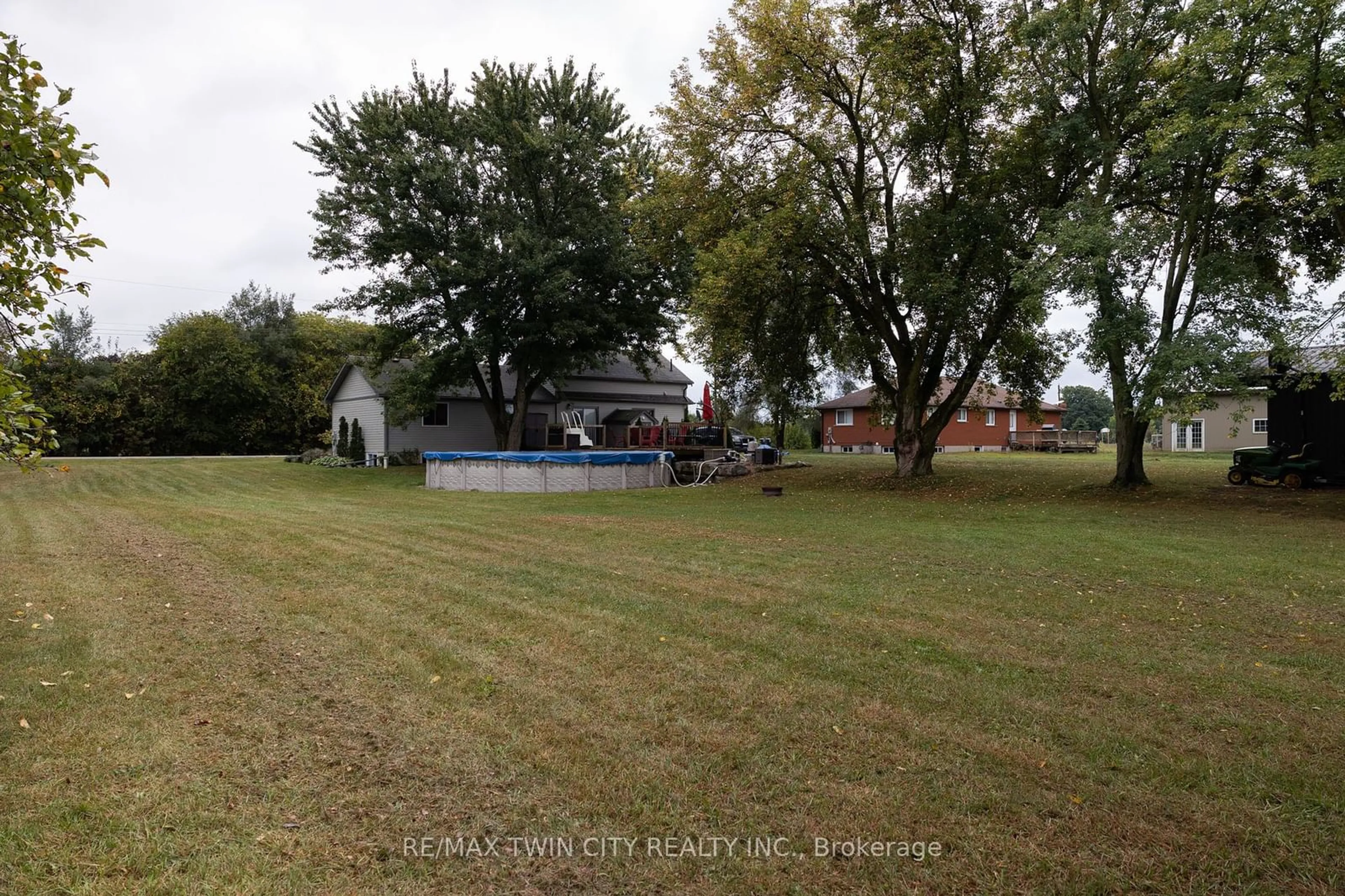 Frontside or backside of a home, the fenced backyard for 4597 KELVIN Rd, Norfolk Ontario N0E 1R0