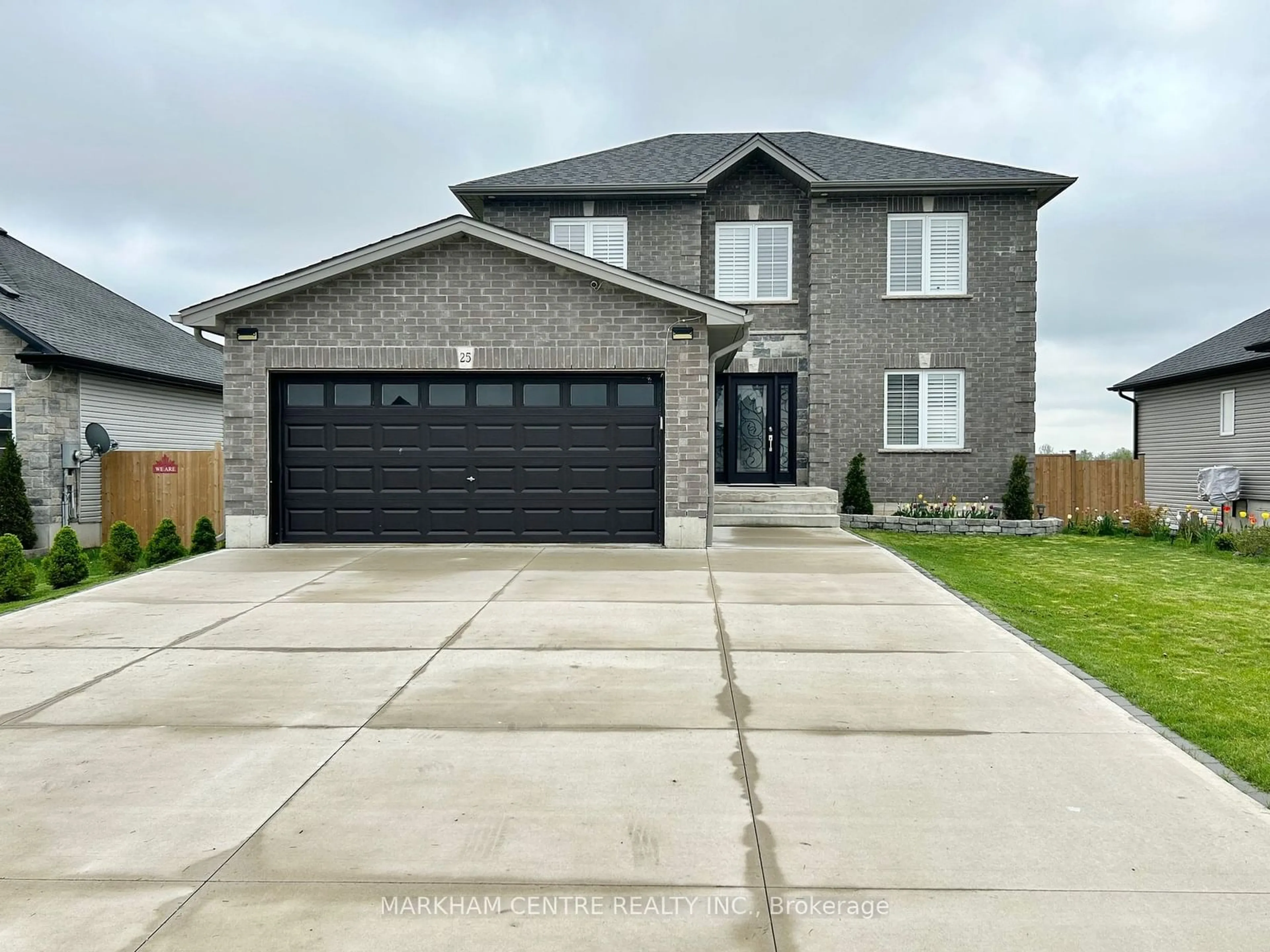 Frontside or backside of a home, the street view for 25 Dennis Dr, Norwich Ontario N0J 1P0