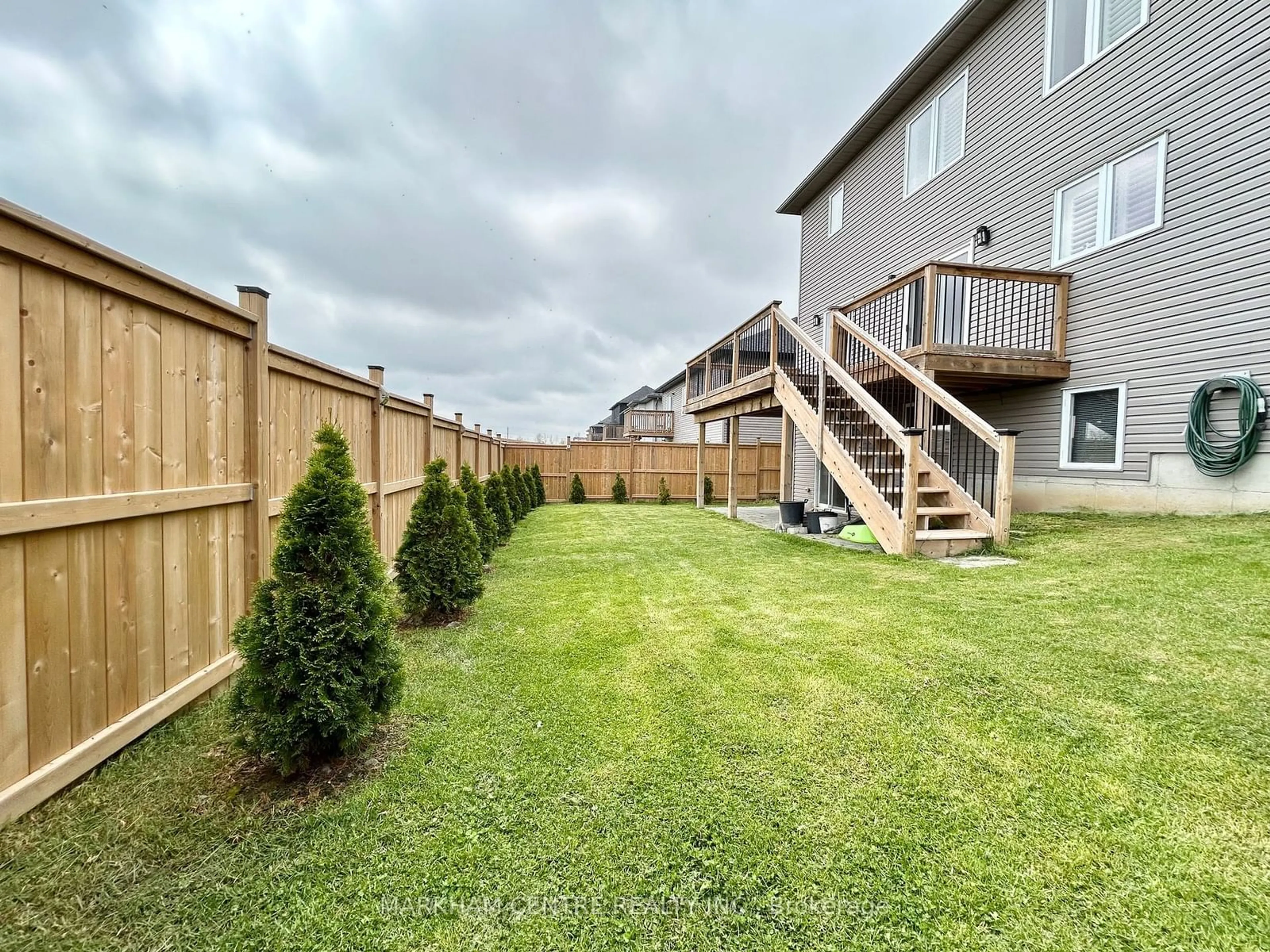 Patio, the fenced backyard for 25 Dennis Dr, Norwich Ontario N0J 1P0