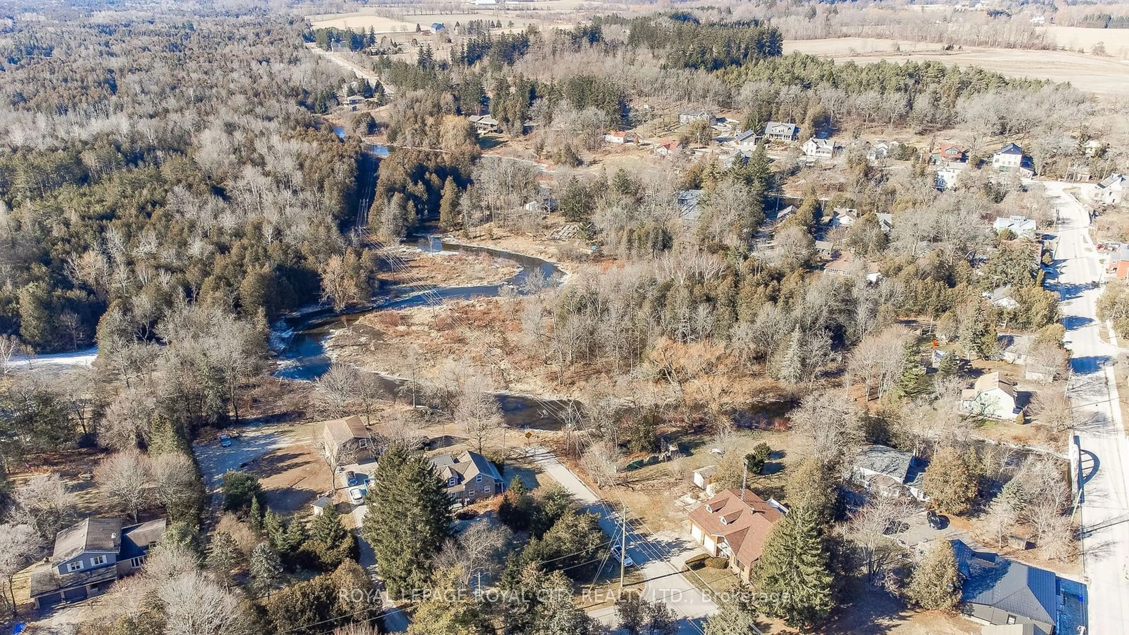 A pic from outside/outdoor area/front of a property/back of a property/a pic from drone, forest/trees view for 400 Wilson St, Guelph/Eramosa Ontario N0B 1P0