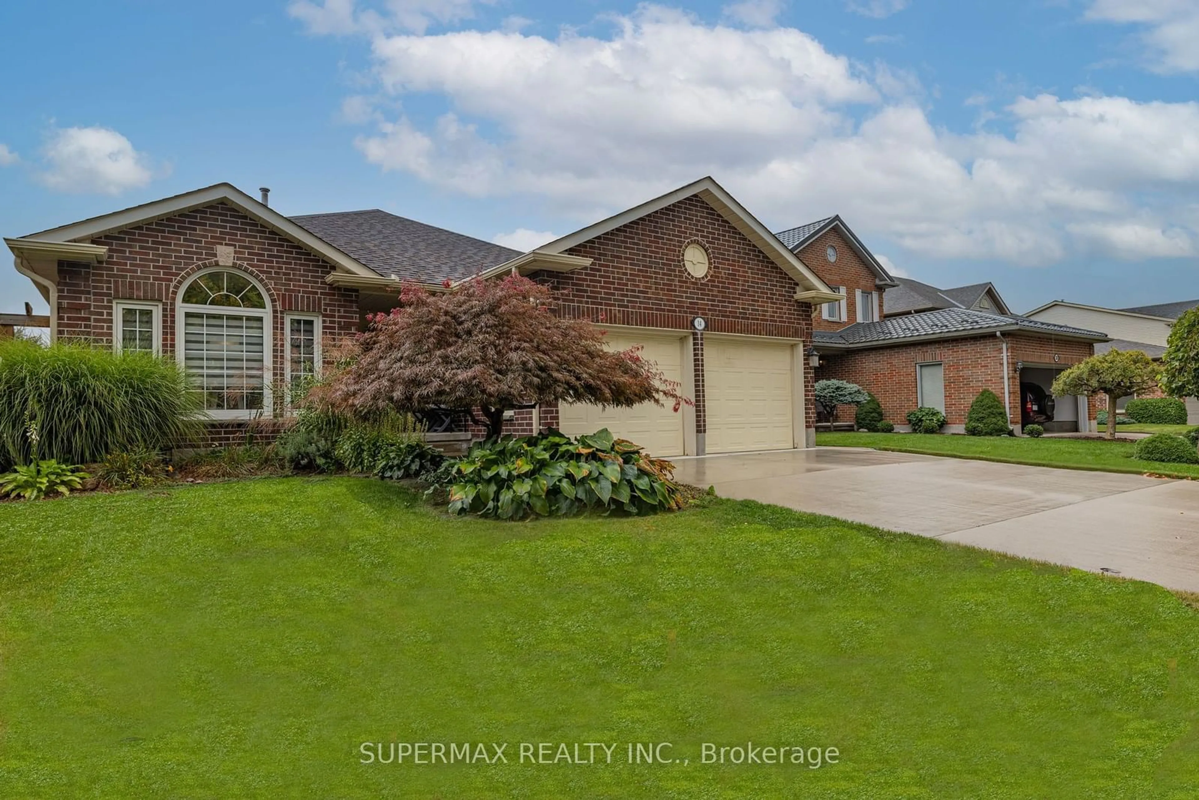 Frontside or backside of a home, the street view for 14 Martinet Ave, London Ontario N5V 4B6