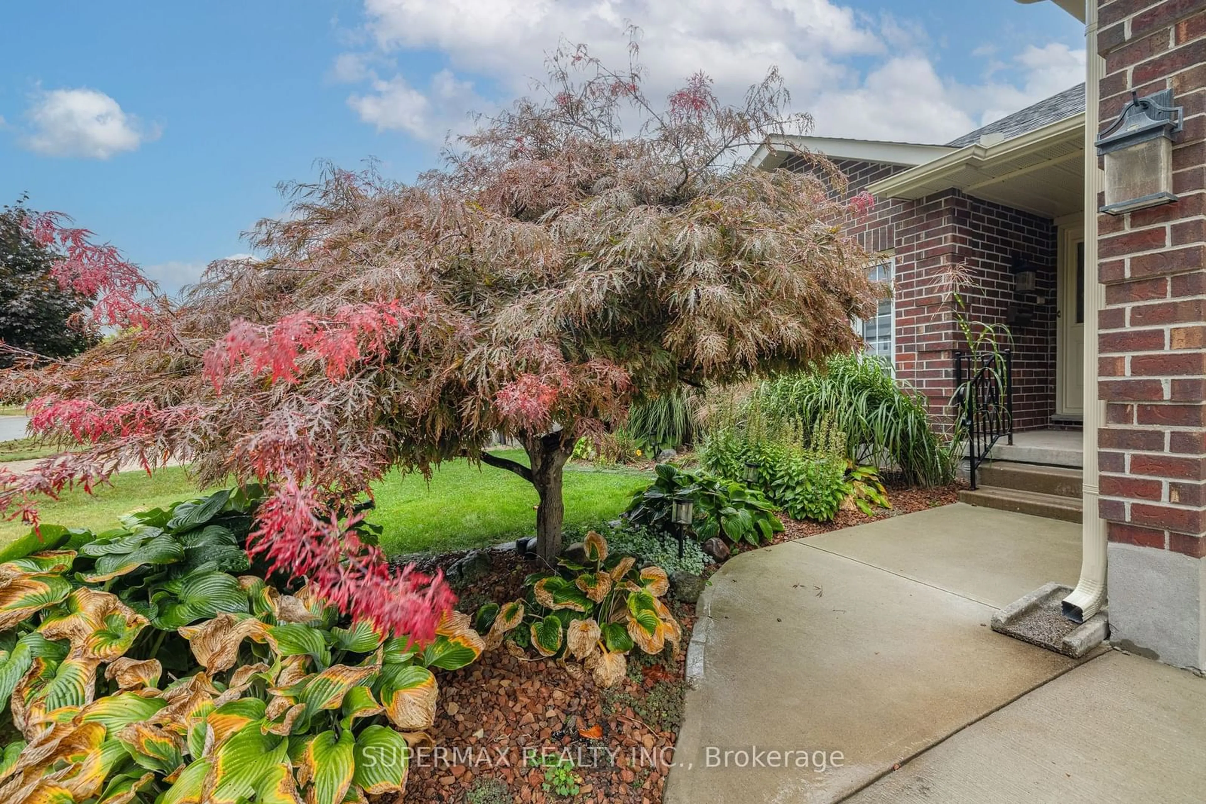 Frontside or backside of a home, the street view for 14 Martinet Ave, London Ontario N5V 4B6