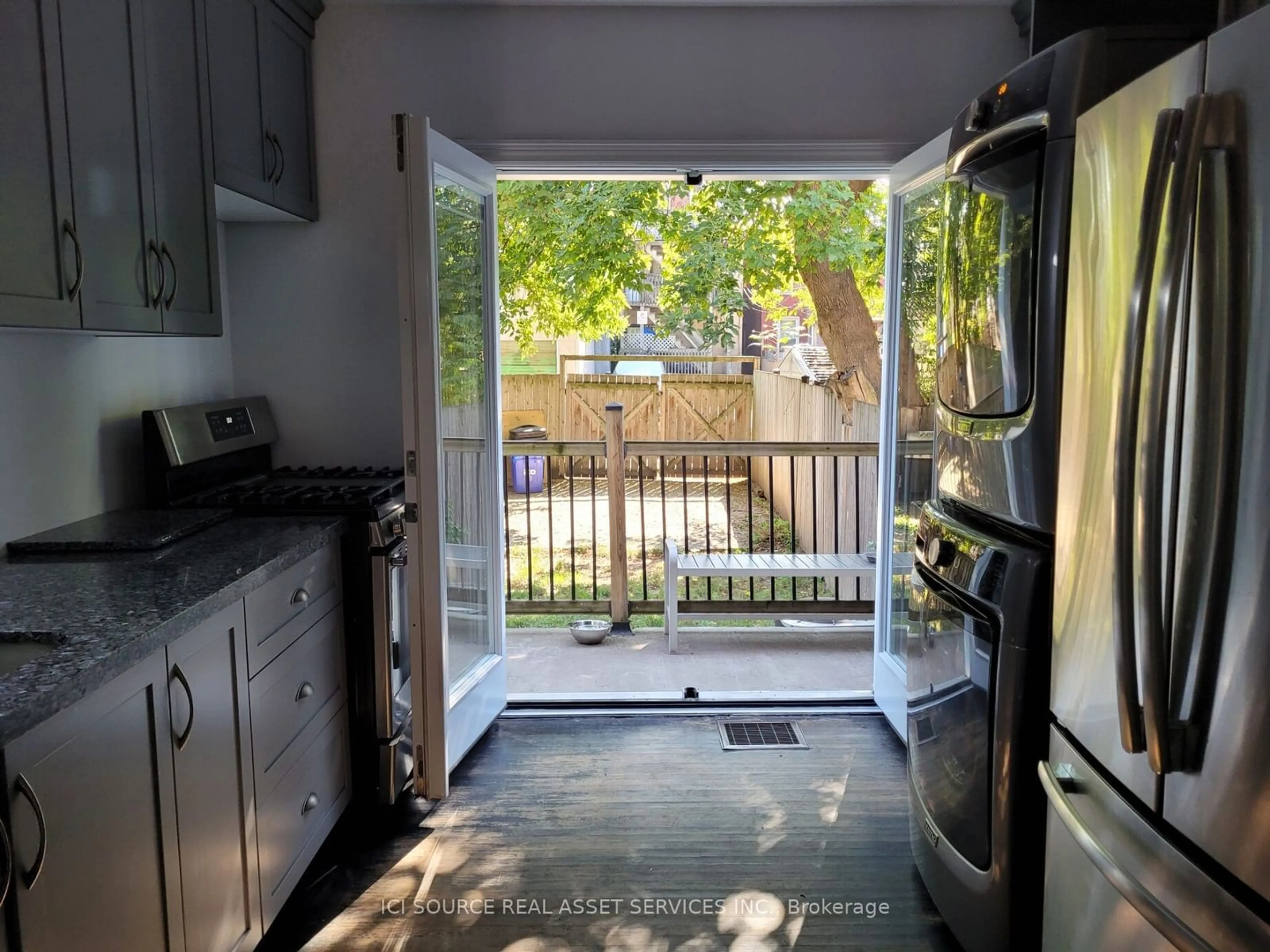 Standard kitchen, cement floor, the street view for 30 Mars Ave, Hamilton Ontario L8L 3V8