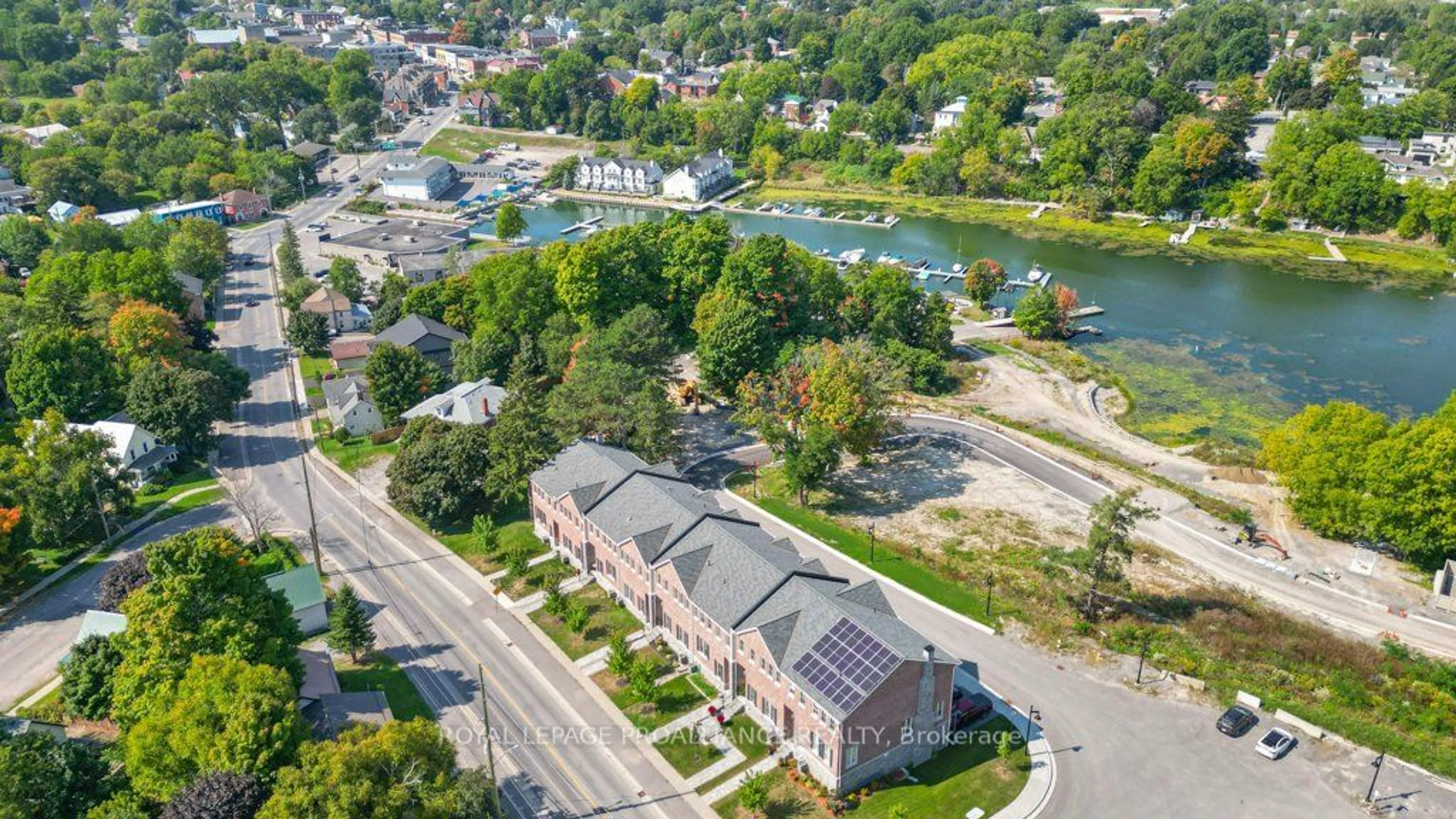 A pic from outside/outdoor area/front of a property/back of a property/a pic from drone, water/lake/river/ocean view for 73C Bridge St, Prince Edward County Ontario K0K 2T0