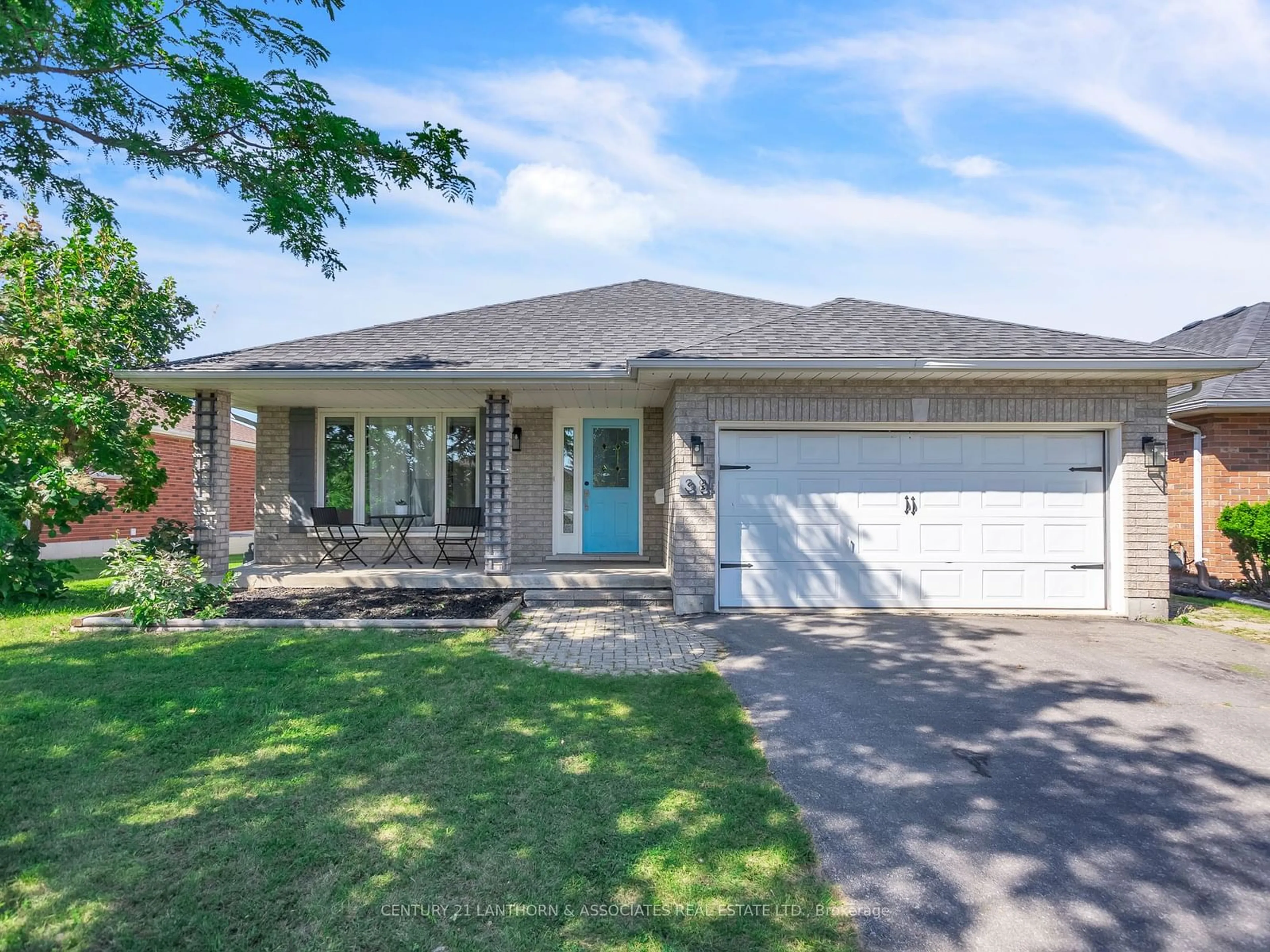 Home with brick exterior material for 38 Hickory Grve, Belleville Ontario K8N 5Y2