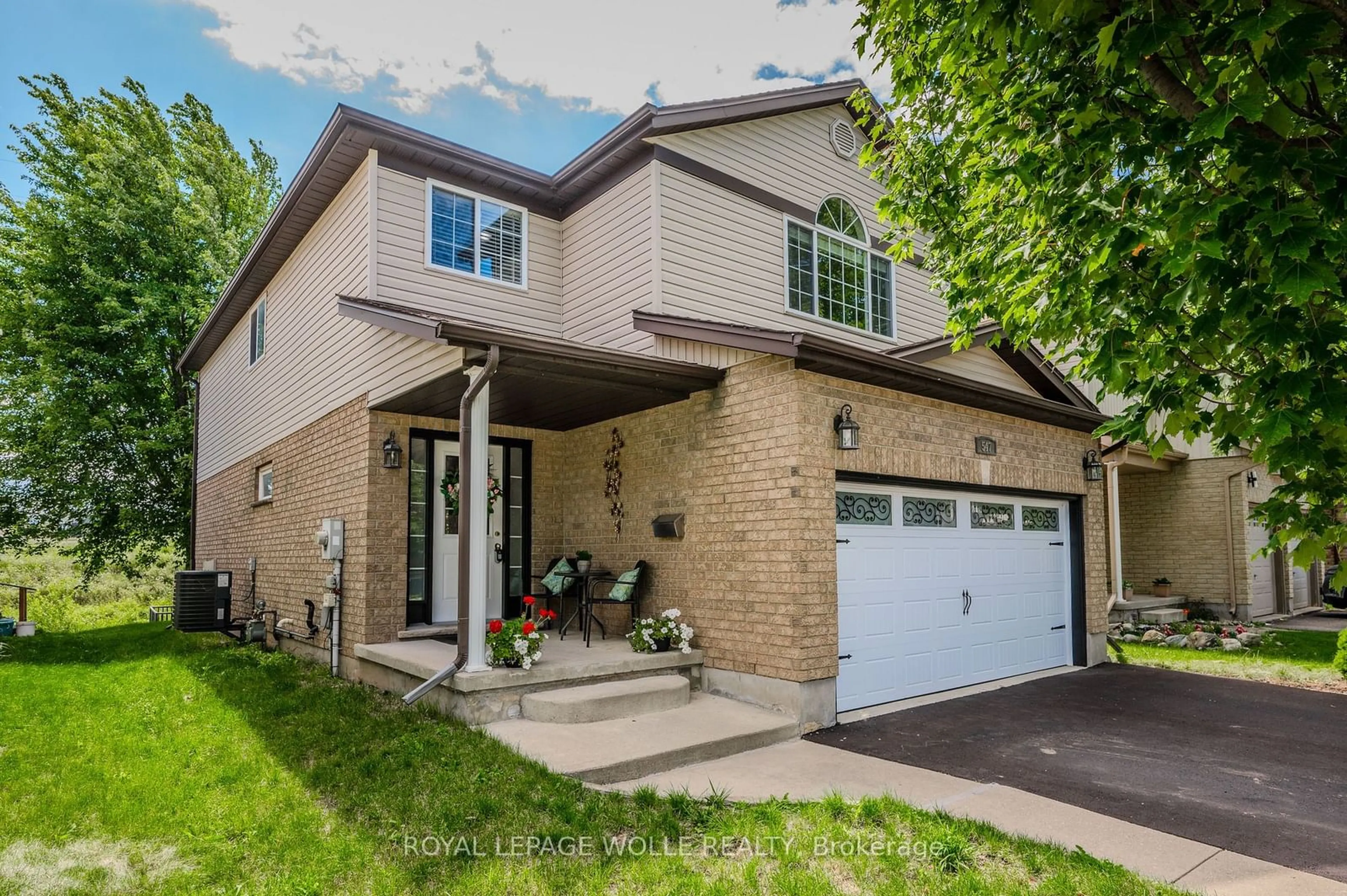 Home with brick exterior material for 547 St Moritz Ave, Waterloo Ontario N2T 2Z4