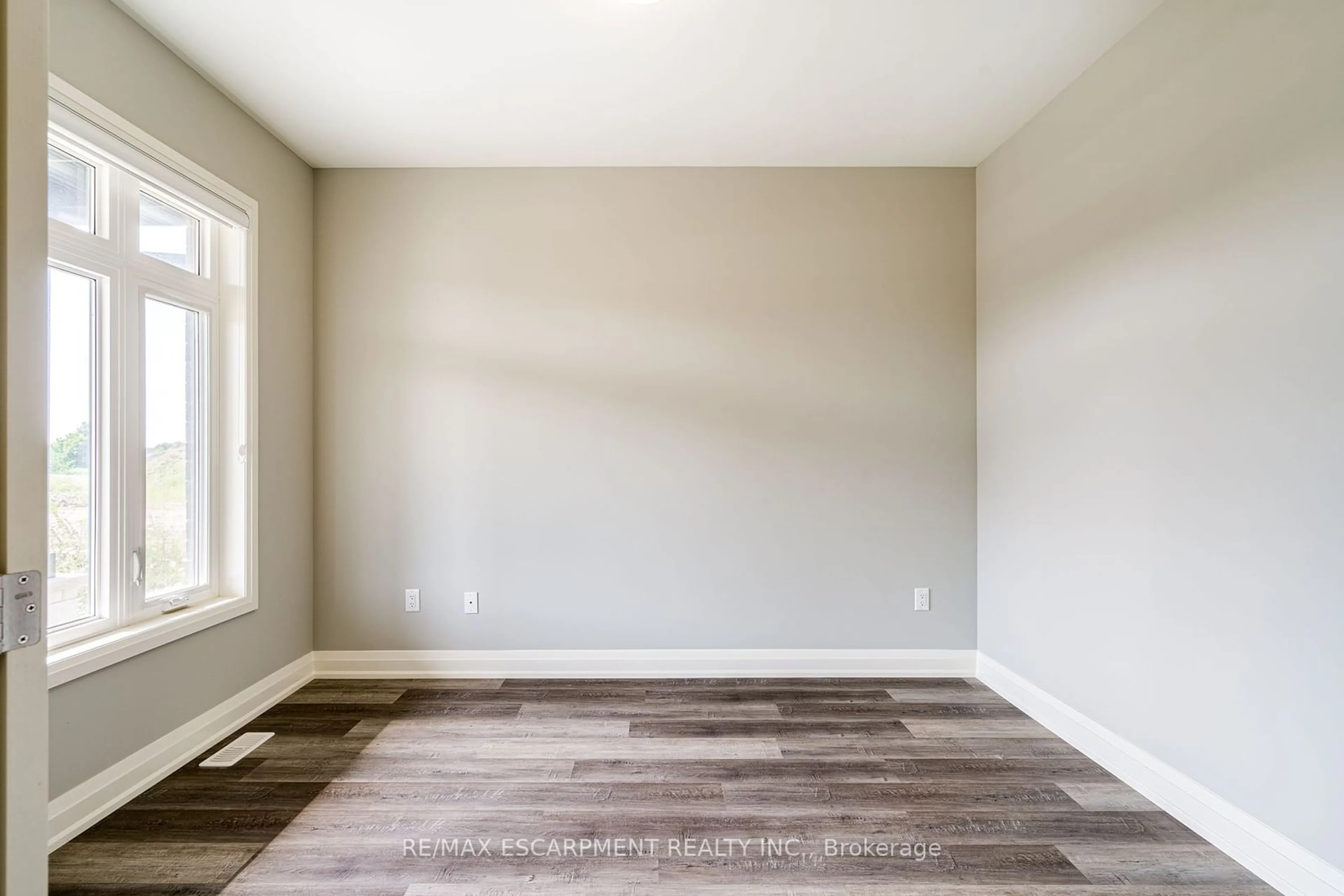 A pic of a room, wood floors for 219 KLEIN Circ, Hamilton Ontario L9G 3K9