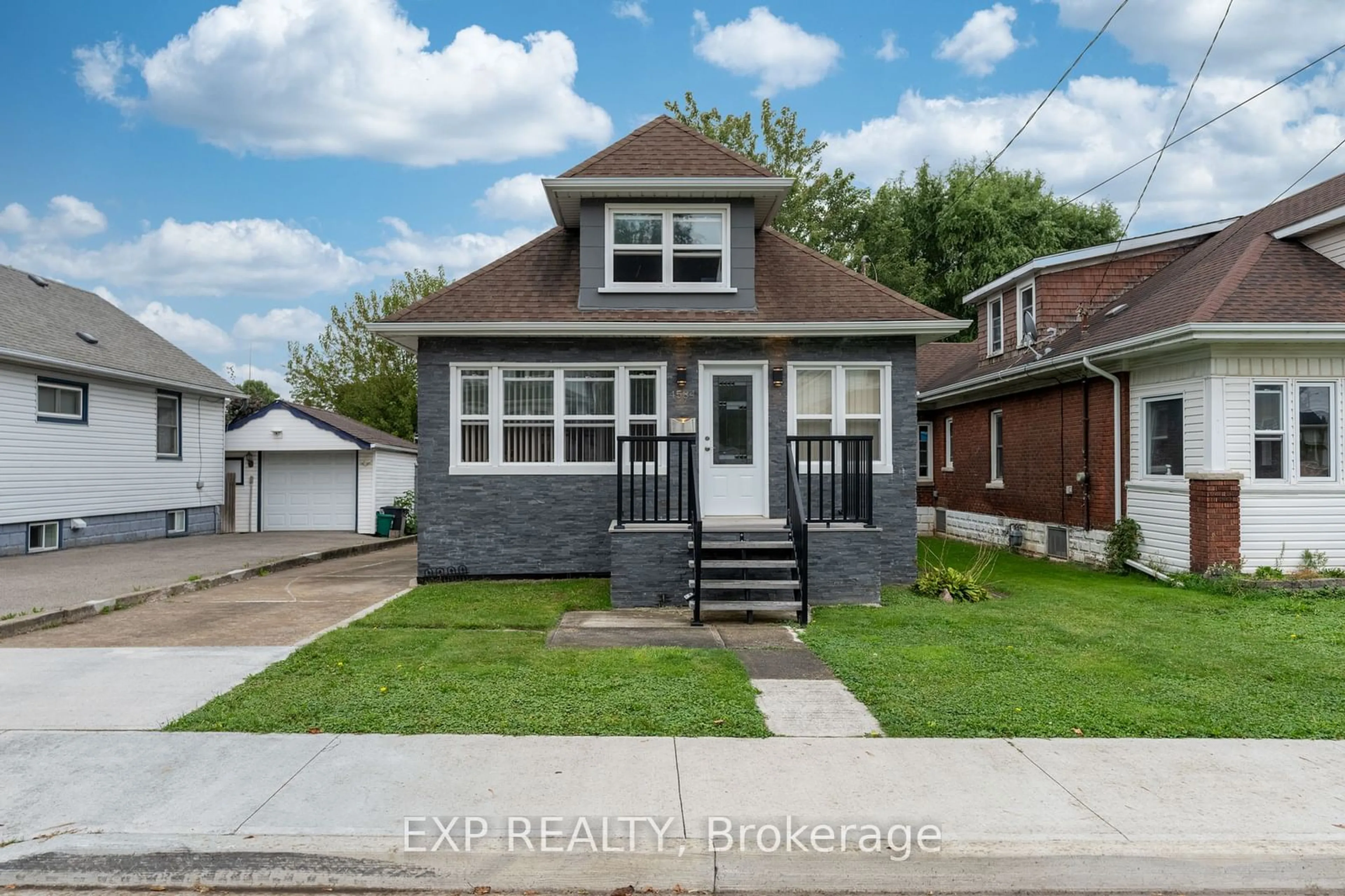 Frontside or backside of a home, the fenced backyard for 4584 Sixth Ave, Niagara Falls Ontario L2E 4T3