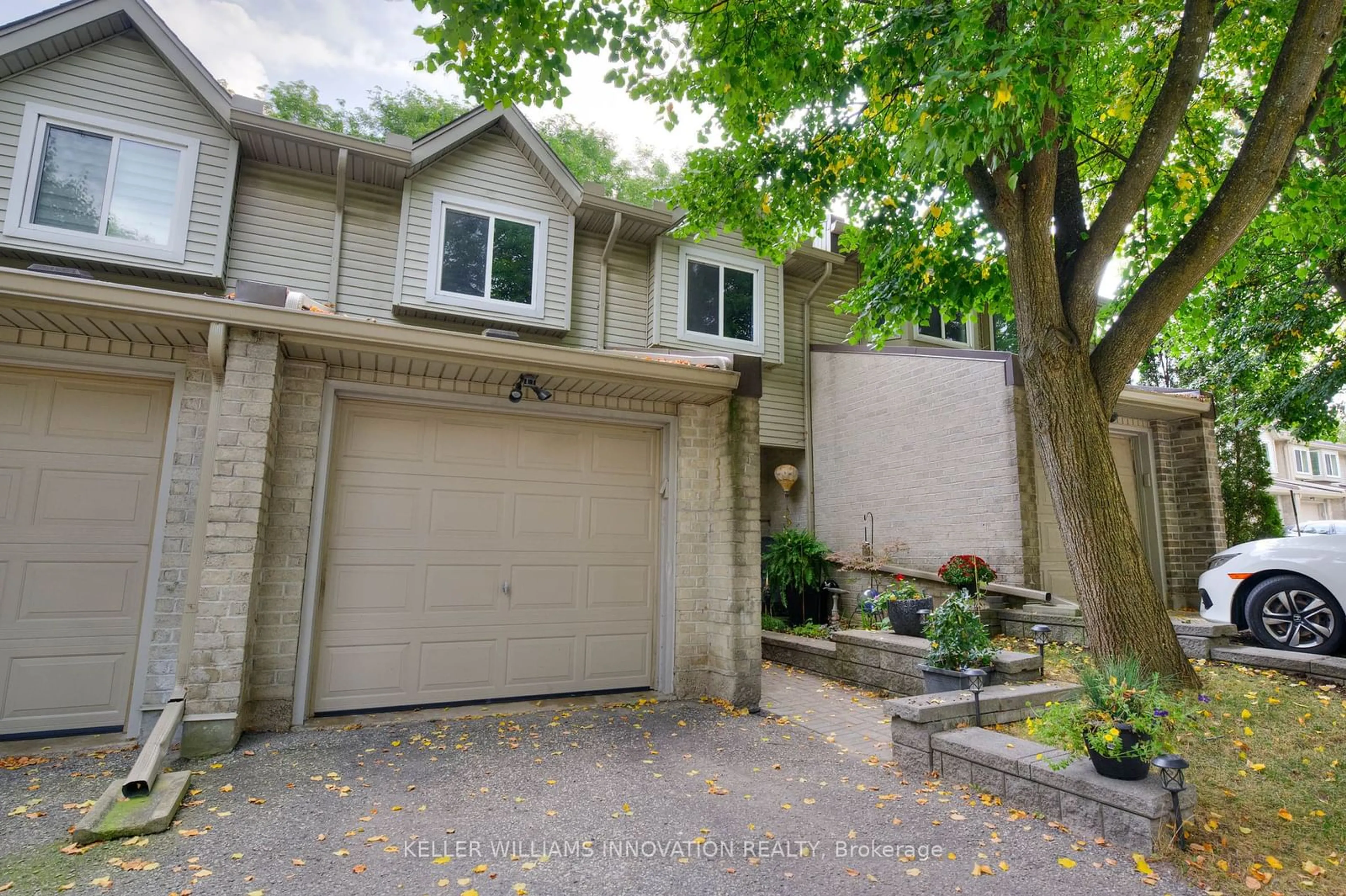 A pic from exterior of the house or condo for 20 Paulander Dr #51, Kitchener Ontario N2M 5L4