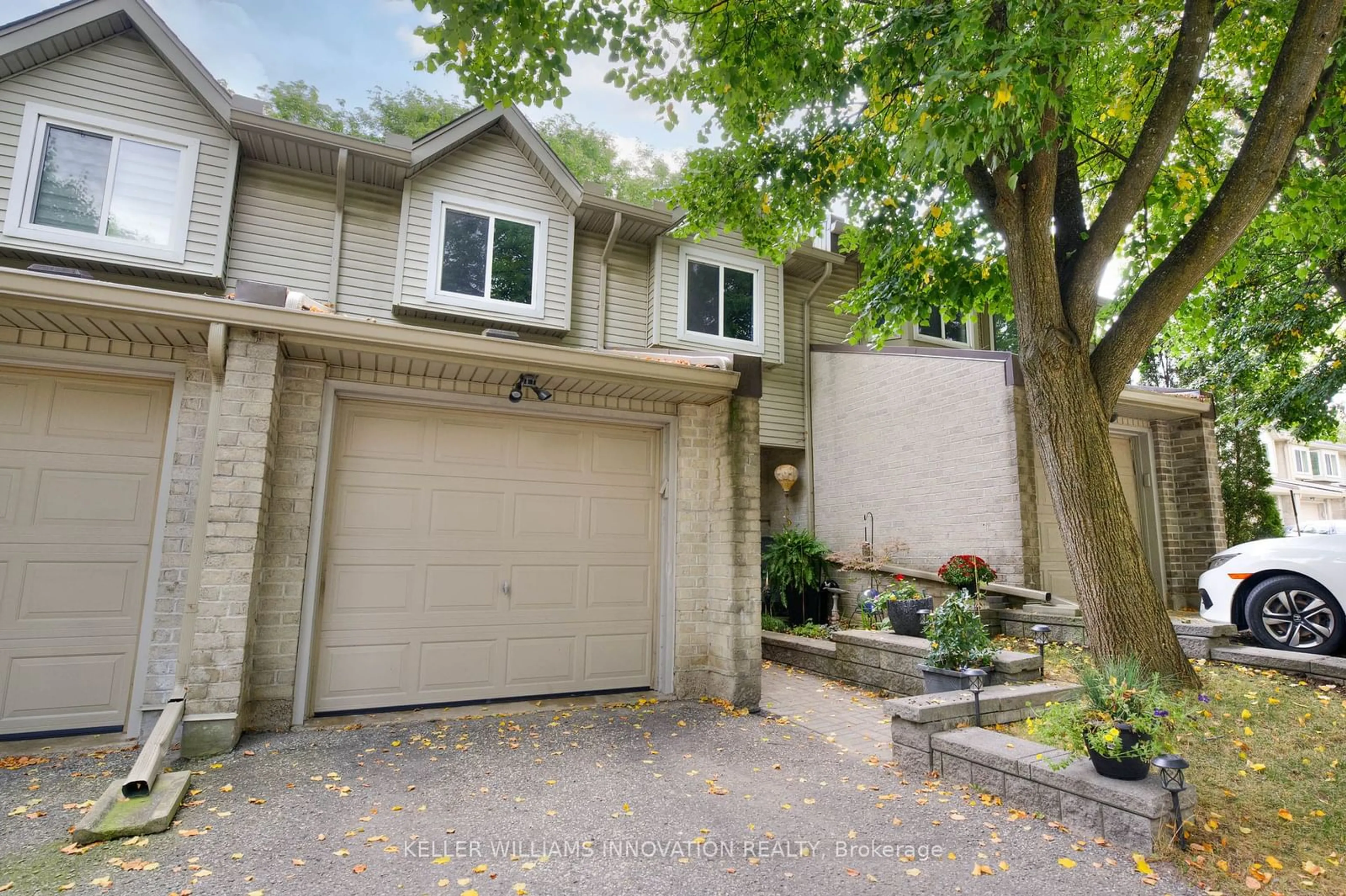 A pic from exterior of the house or condo for 20 Paulander Dr #51, Kitchener Ontario N2M 5L4