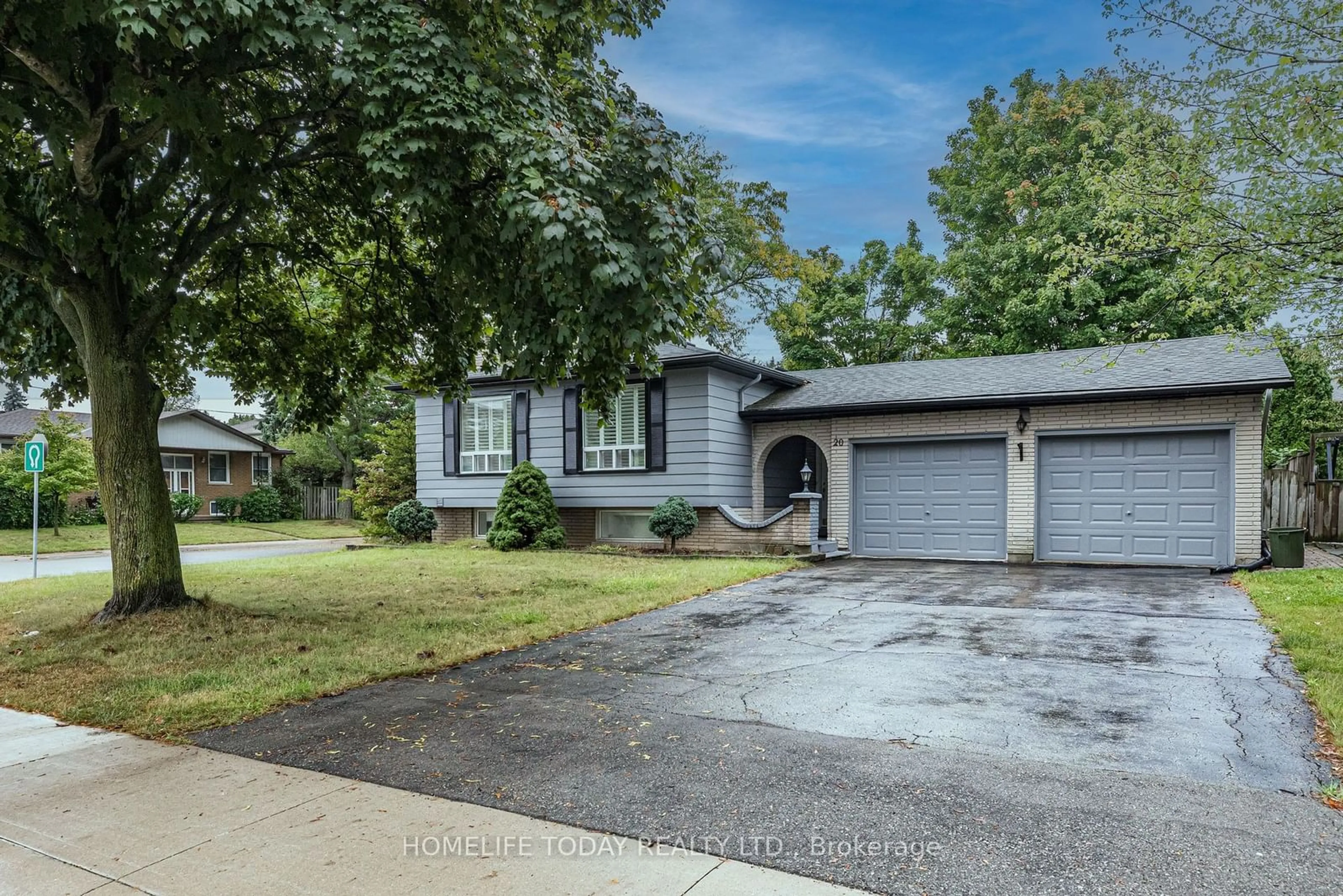 Frontside or backside of a home for 20 Magnolia Dr, Hamilton Ontario L9C 5S9