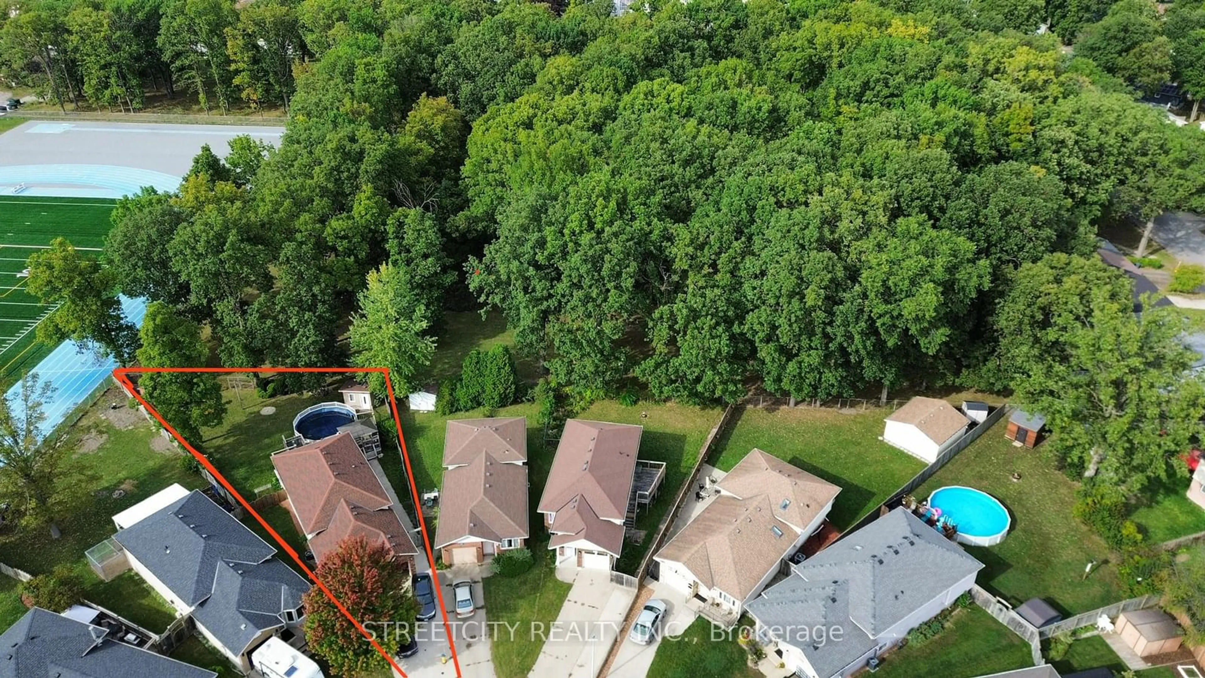 Frontside or backside of a home, the fenced backyard for 531 CHANTEL Crt, Sarnia Ontario N7S 6H7