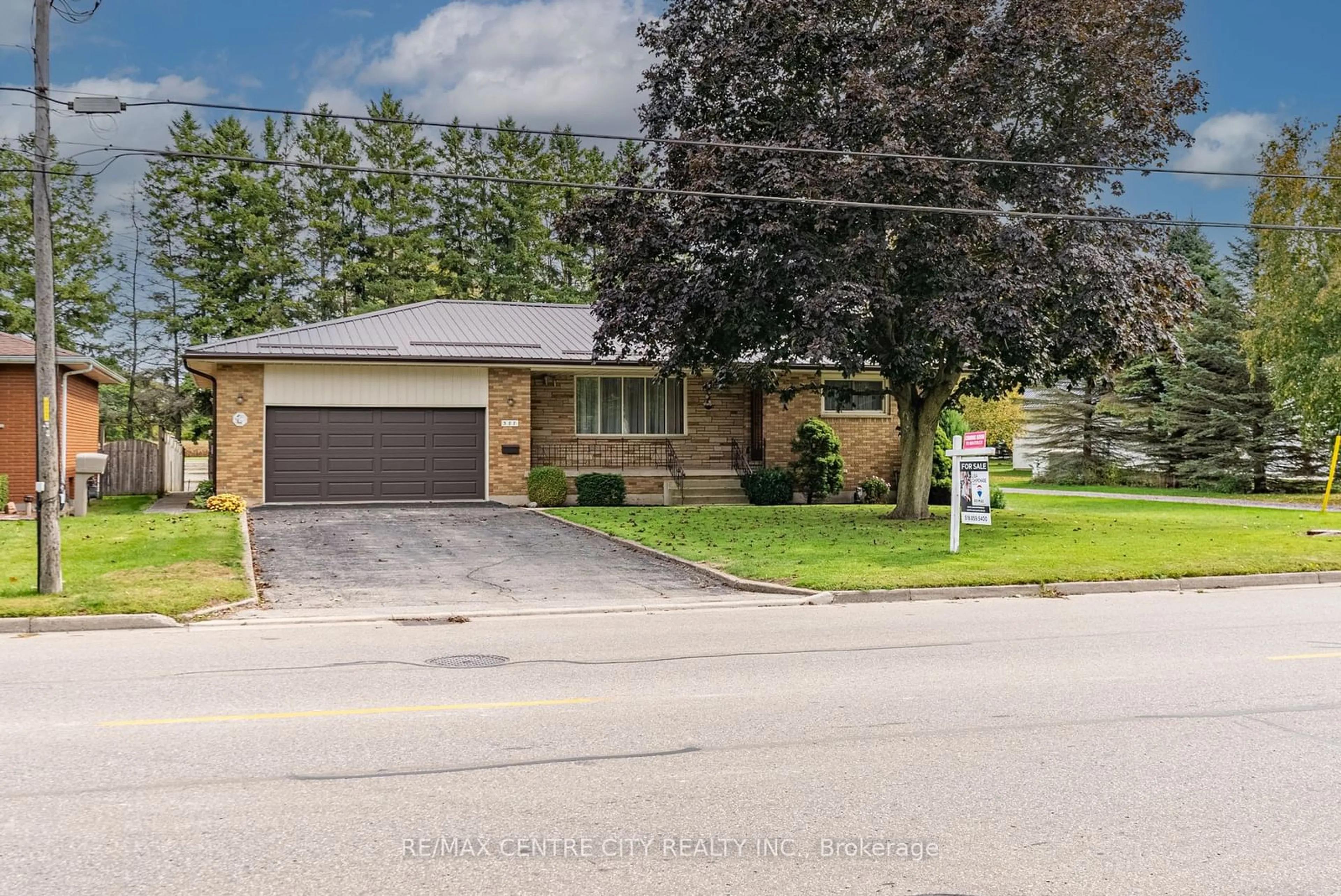 Frontside or backside of a home, the street view for 387 John St, Aylmer Ontario N5H 2E3