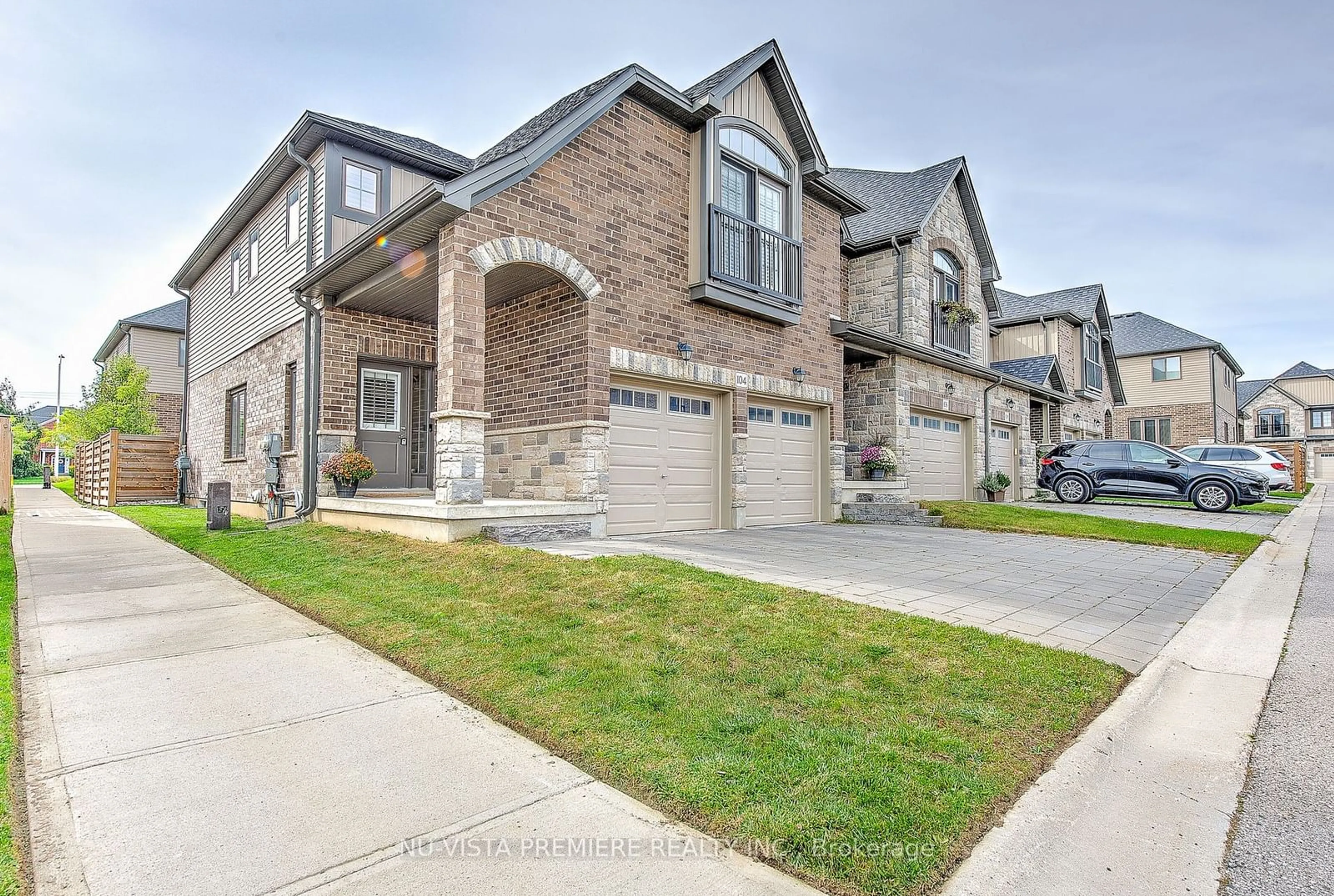 A pic from exterior of the house or condo, the street view for 2040 SHORE Rd #104, London Ontario N6K 0G3