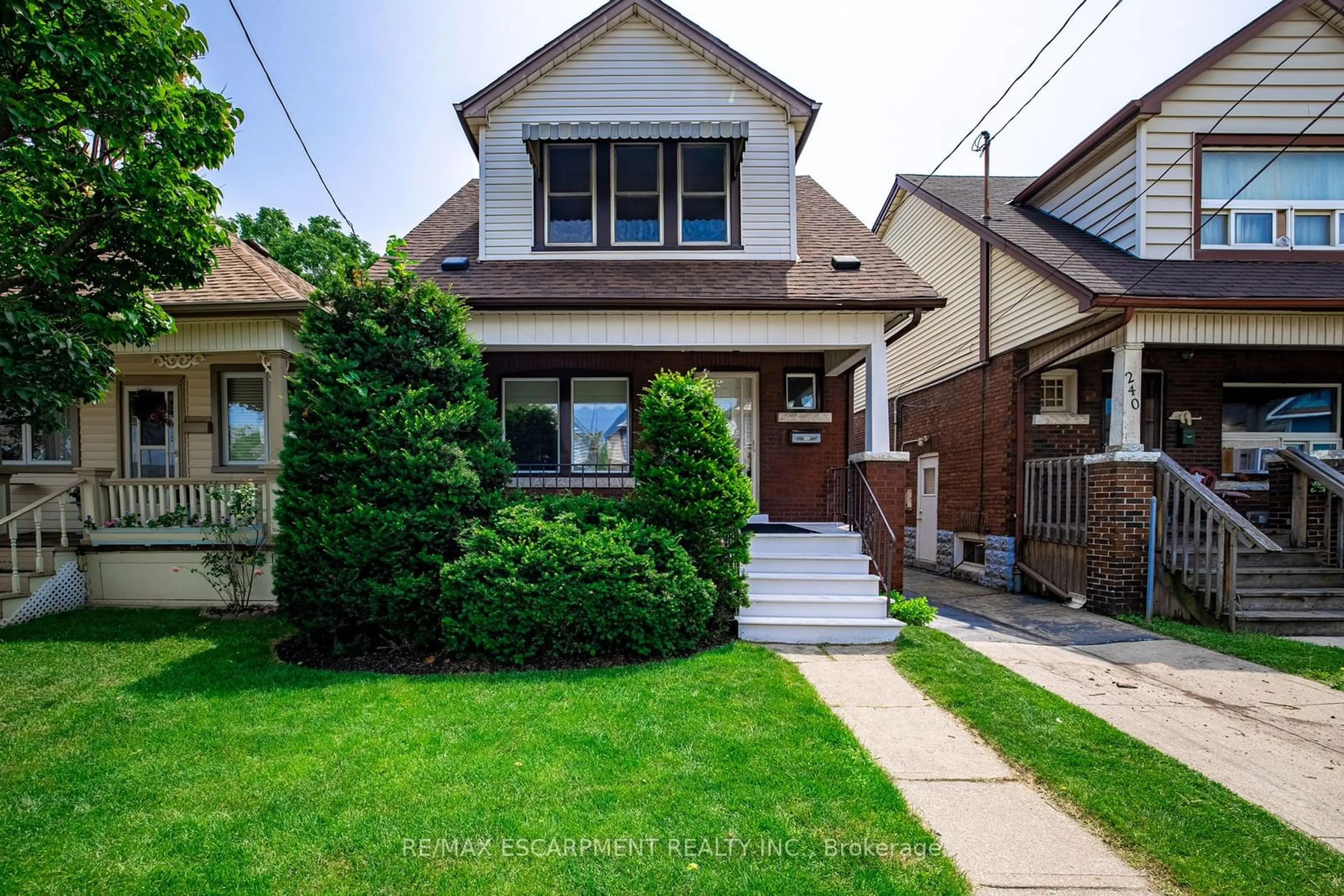 Home with brick exterior material, street for 242 Glendale Ave, Hamilton Ontario L8L 7K3