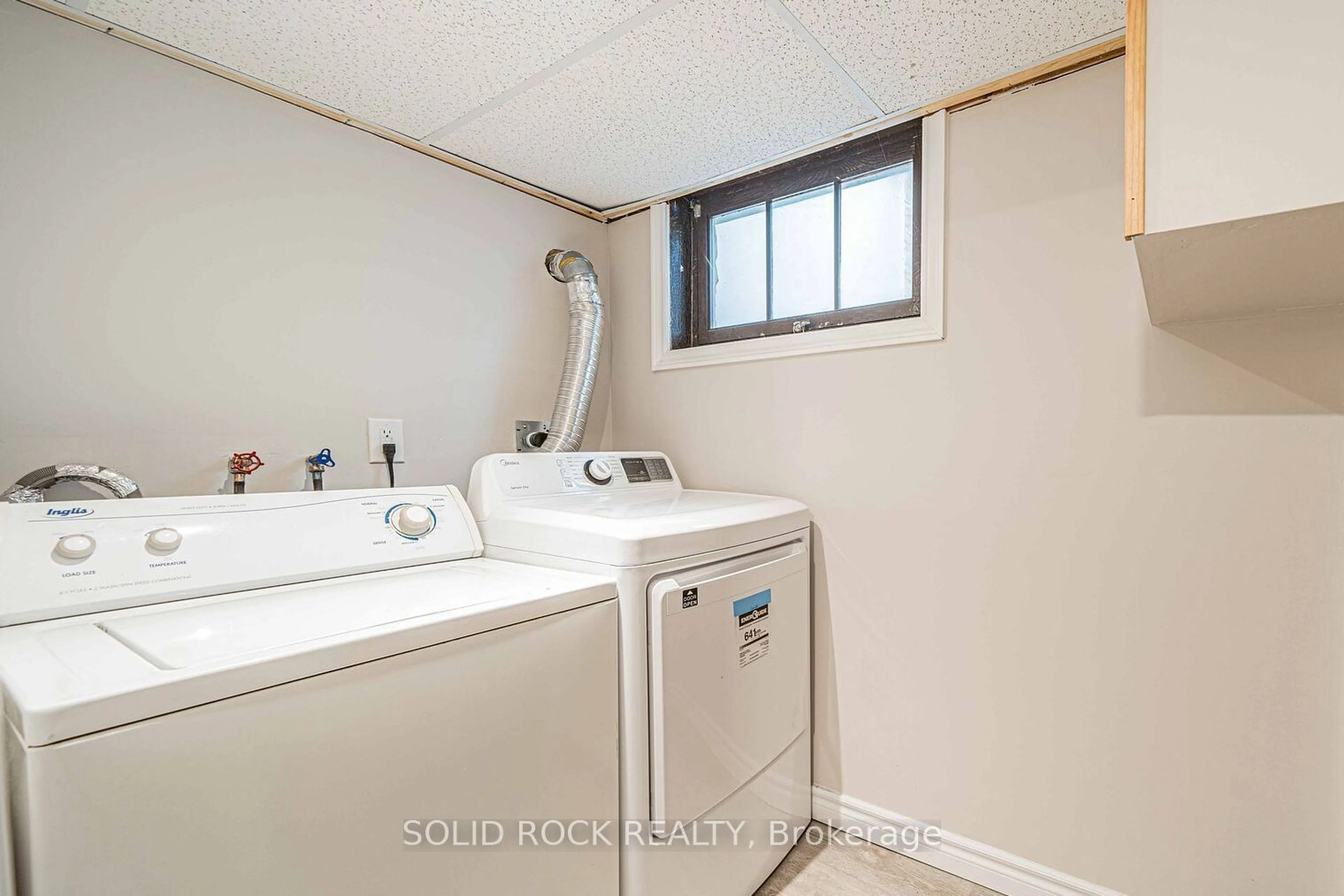 Laundry room for 205 Ivon Ave, Hamilton Ontario L8H 5S9