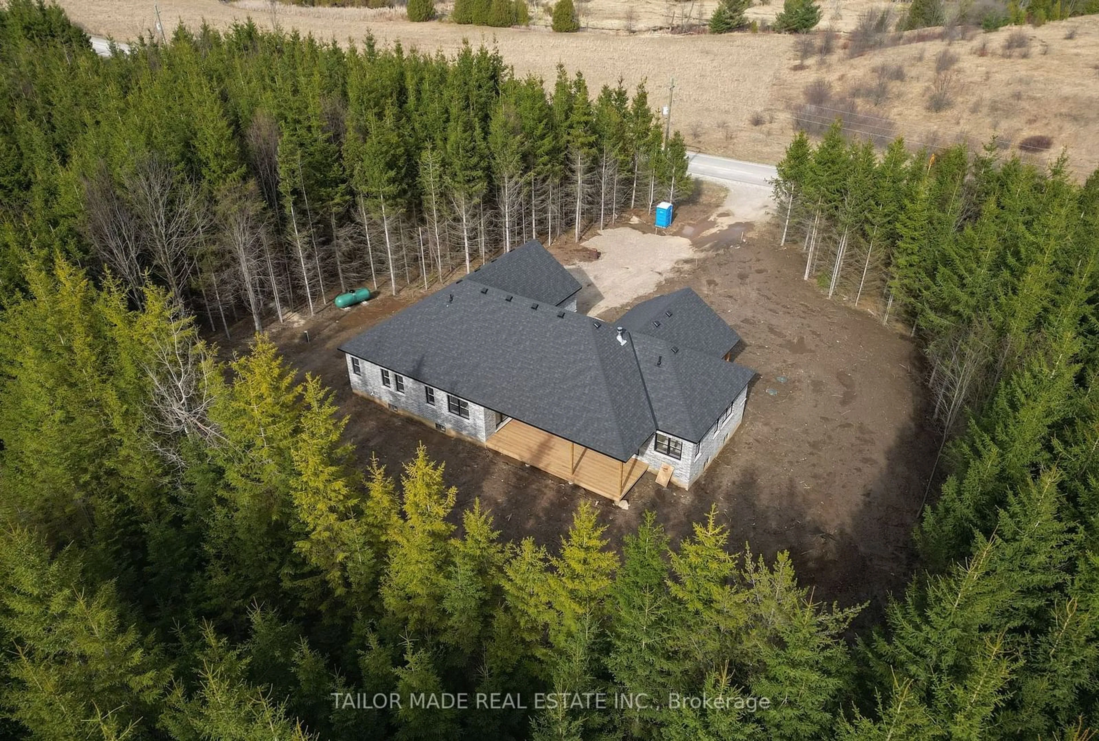 A pic from outside/outdoor area/front of a property/back of a property/a pic from drone, forest/trees view for 537266 Main St, Melancthon Ontario L0N 1J0