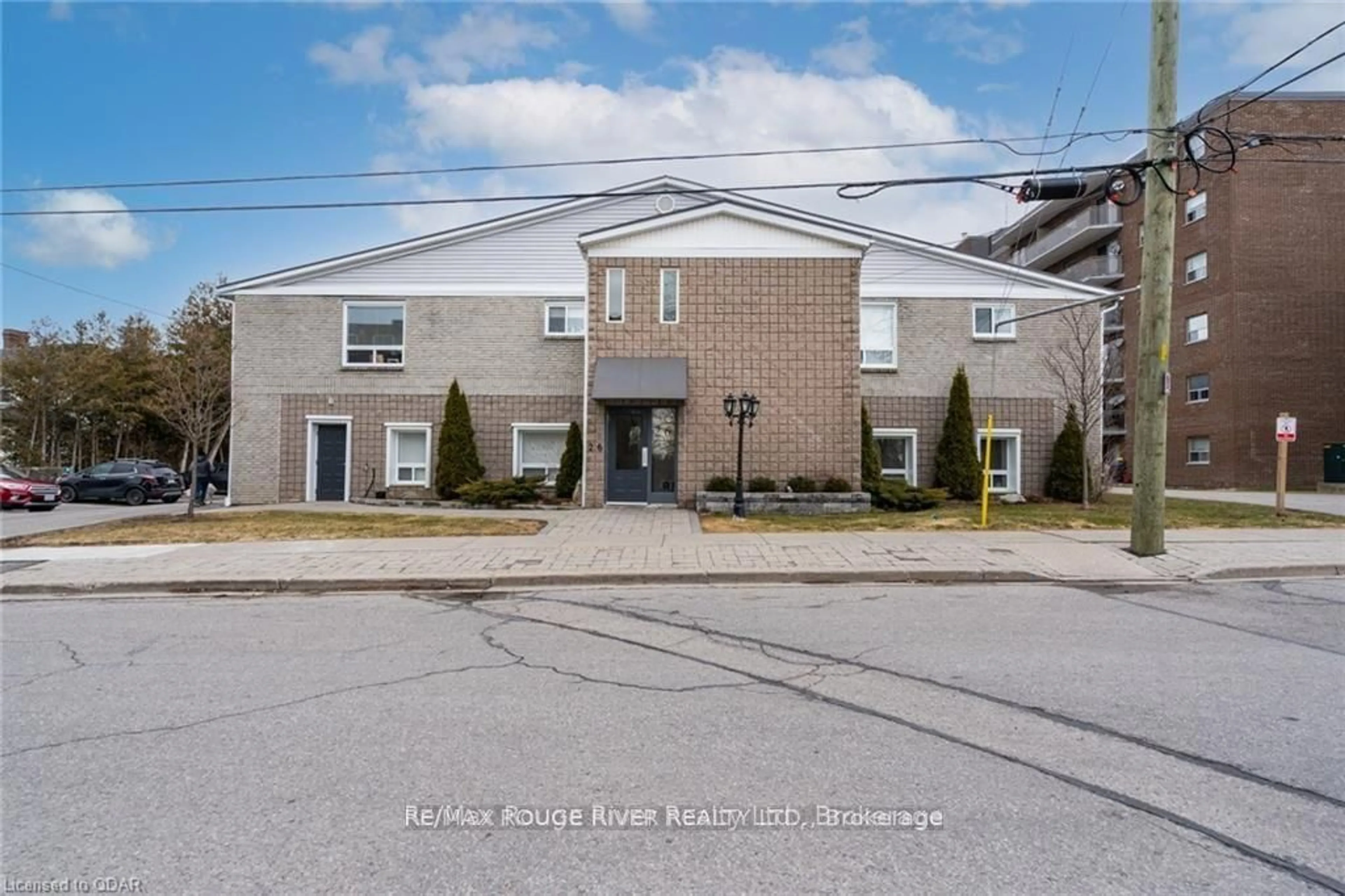 A pic from exterior of the house or condo, the front or back of building for 26 Spencer St #102, Cobourg Ontario K9A 1C2