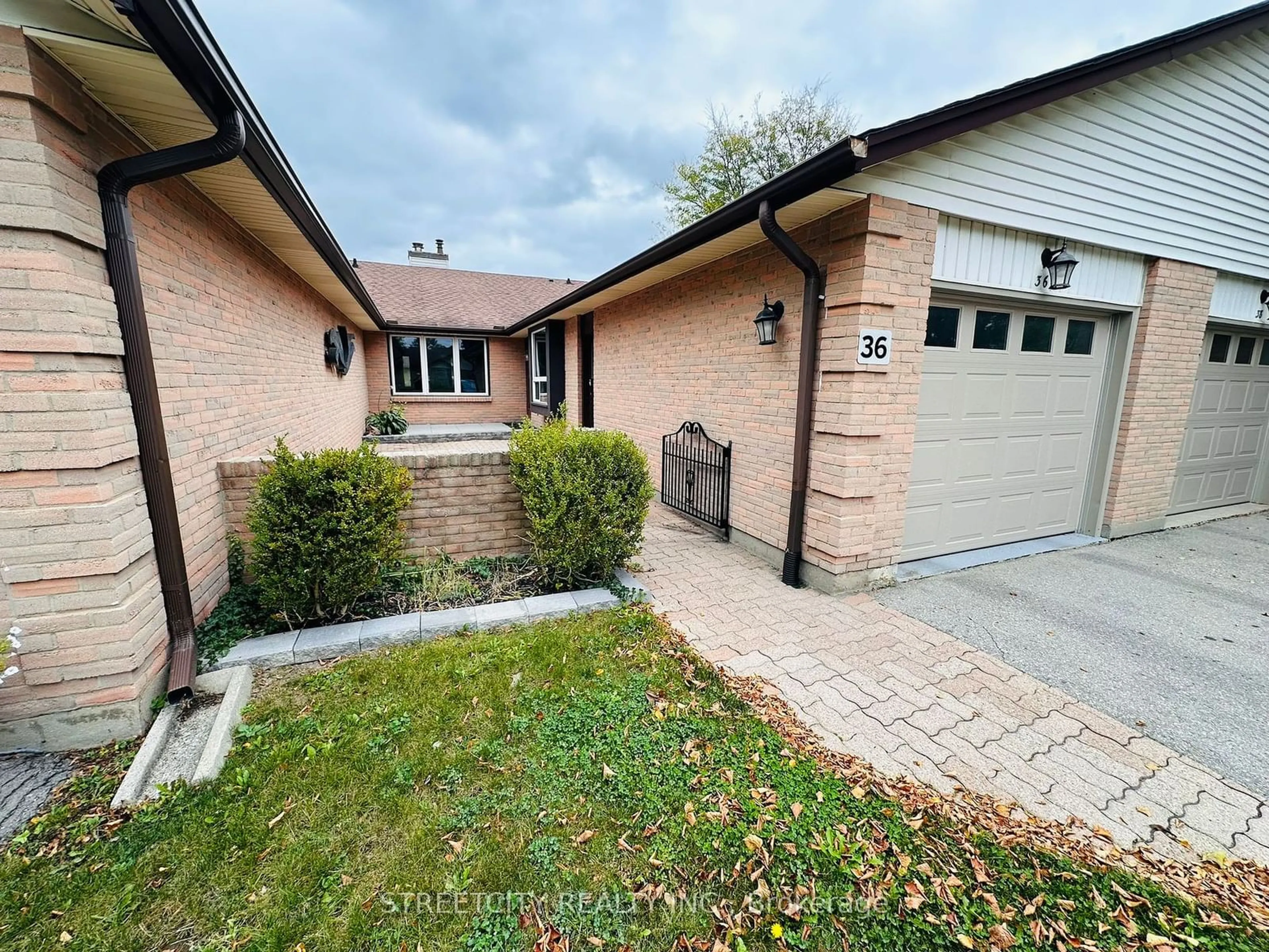 Home with brick exterior material for 60 FIDDLERS GREEN Rd #36, London Ontario N6H 4S7