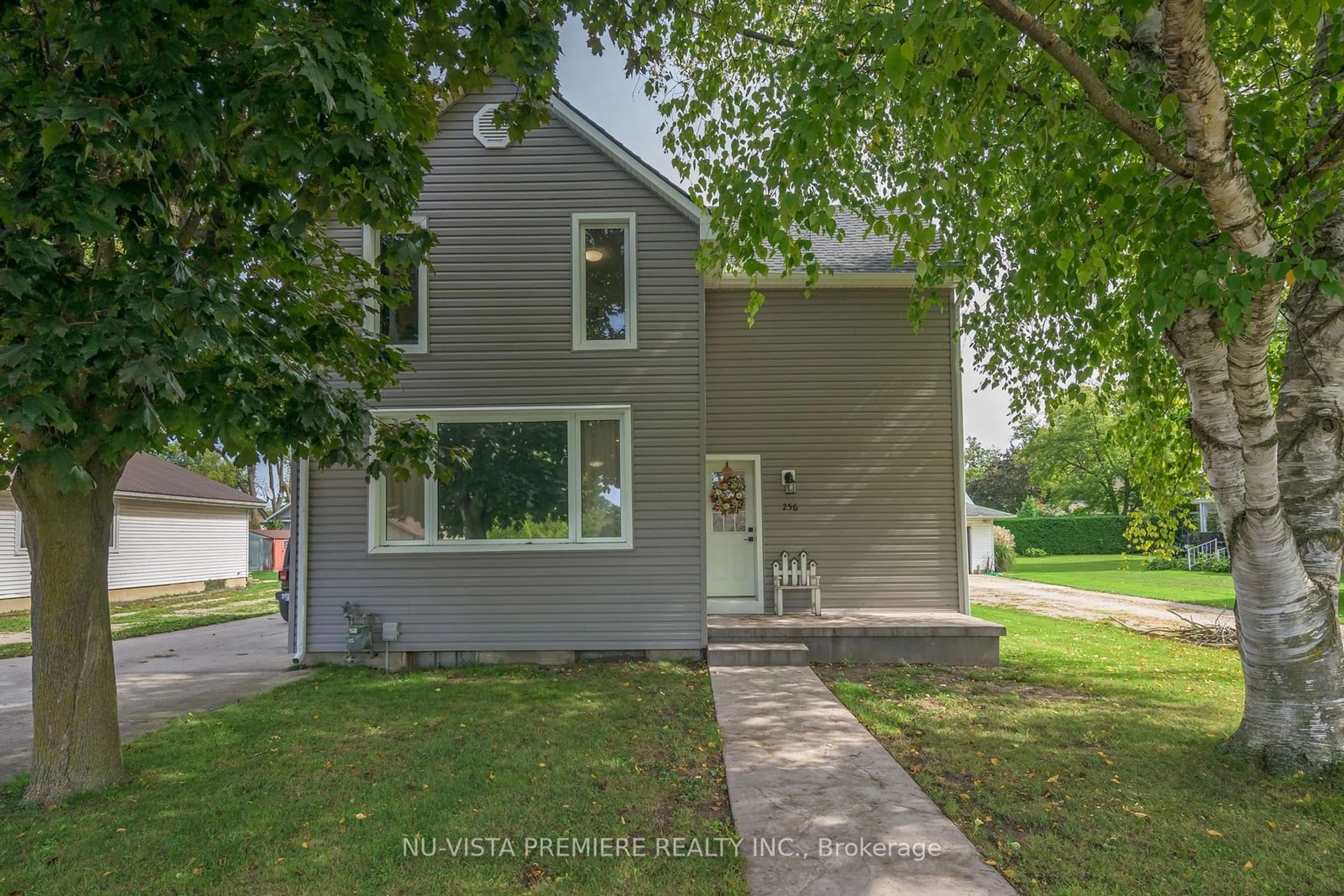 Frontside or backside of a home, the street view for 256 Pearl St, North Middlesex Ontario N0M 2K0