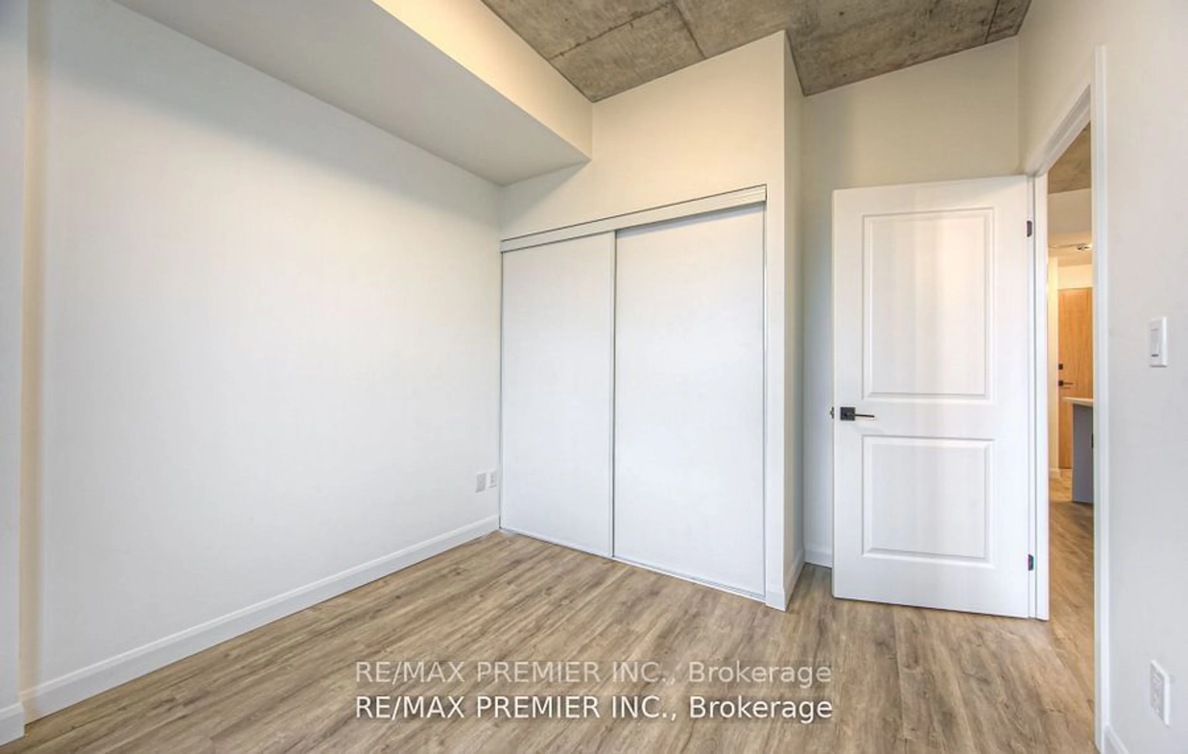 A pic of a room, wood floors for 7 Erie Ave #210, Brantford Ontario N3S 2E7