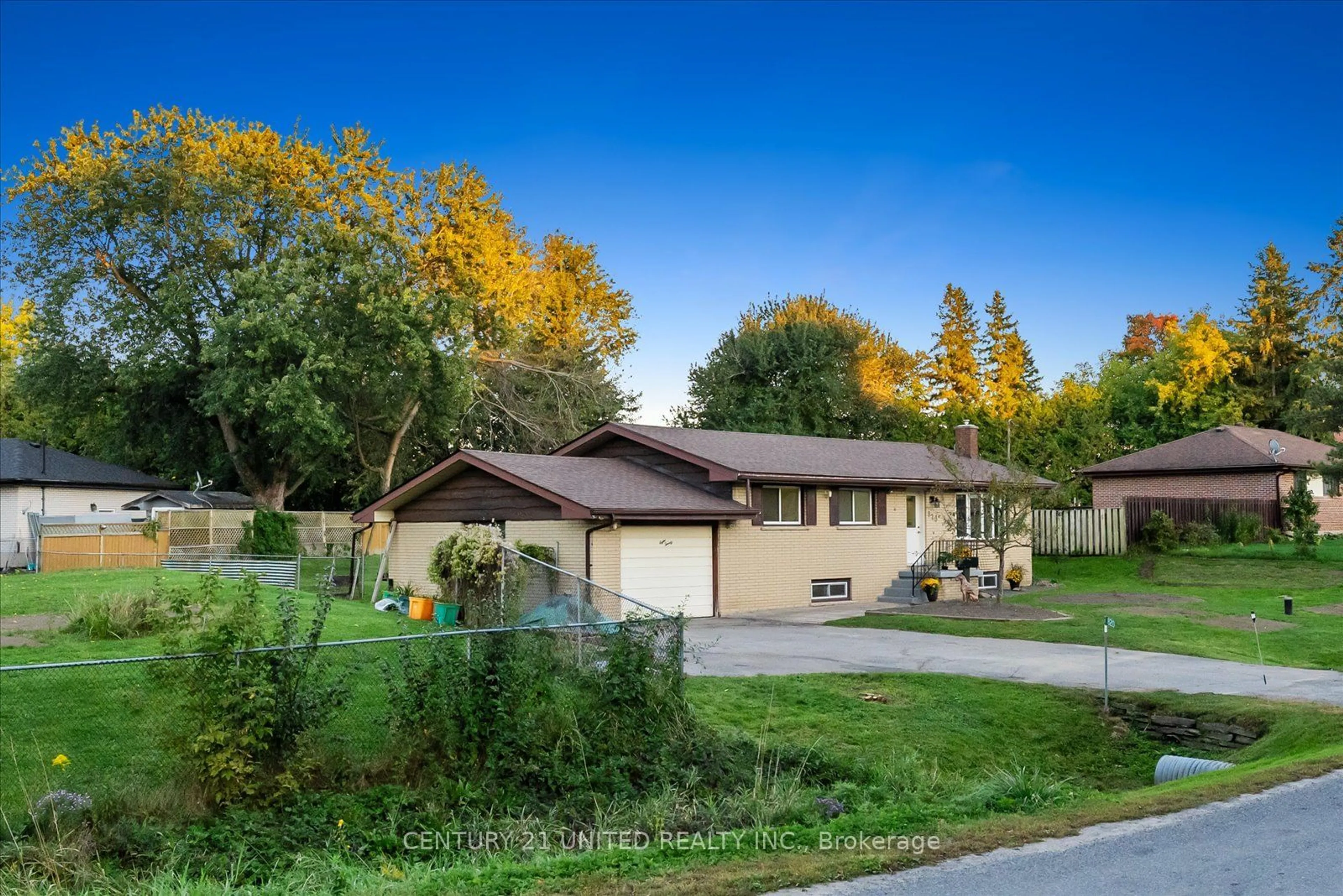 Frontside or backside of a home, the fenced backyard for 820 Clinton Ave, Douro-Dummer Ontario K9L 1A3