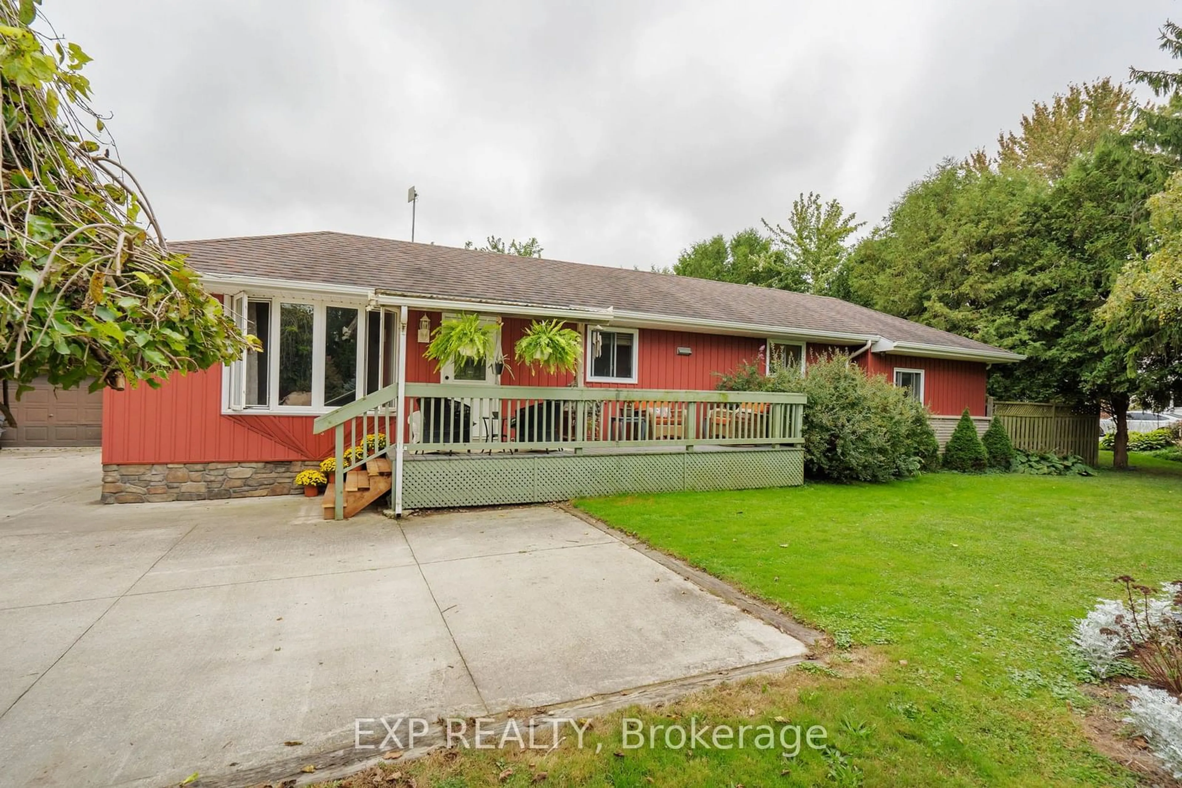 Frontside or backside of a home, the fenced backyard for 21837 Hoskins Line, West Elgin Ontario N0L 2C0