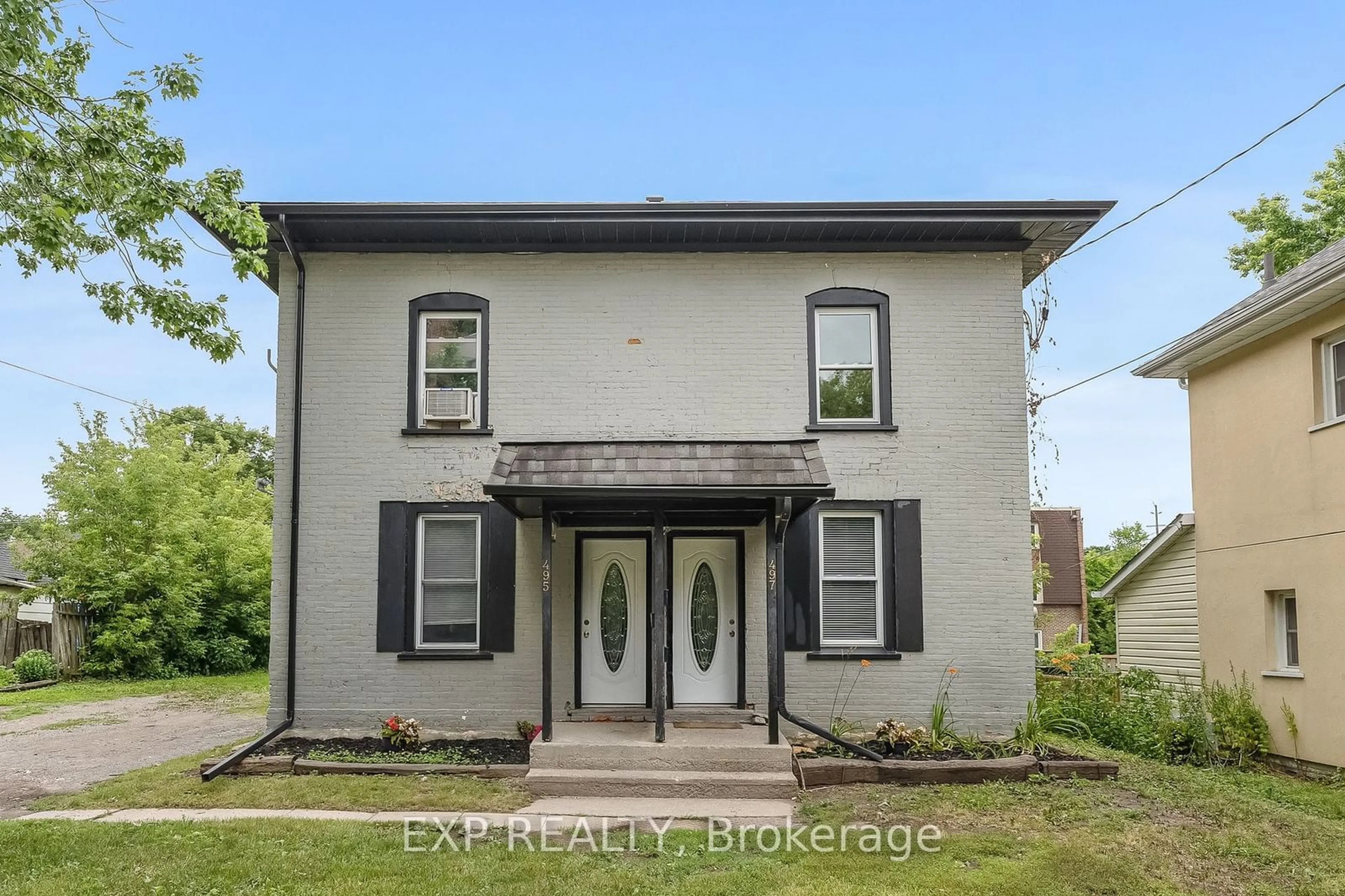 Frontside or backside of a home, the front or back of building for 495/497 Donegal St, Peterborough Ontario K9H 4L9