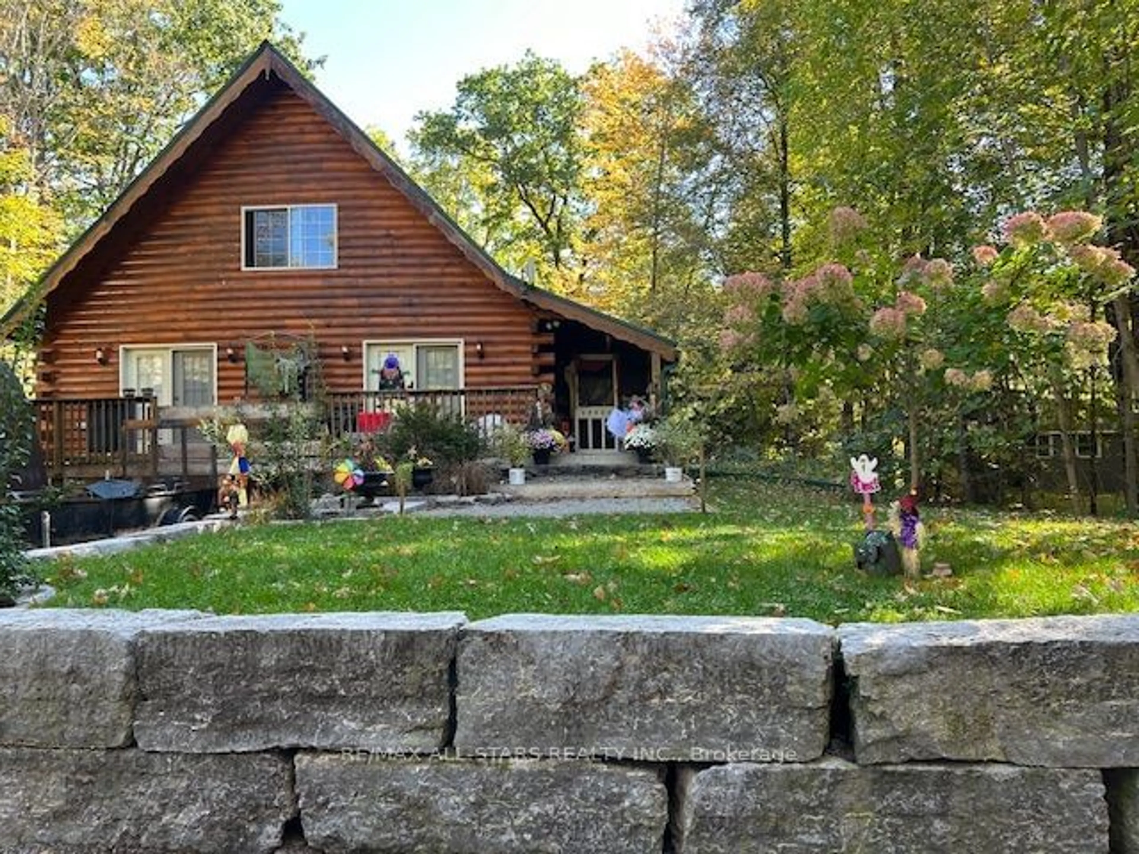 Frontside or backside of a home, cottage for 355 Kennedy Dr, Kawartha Lakes Ontario K0M 1A0