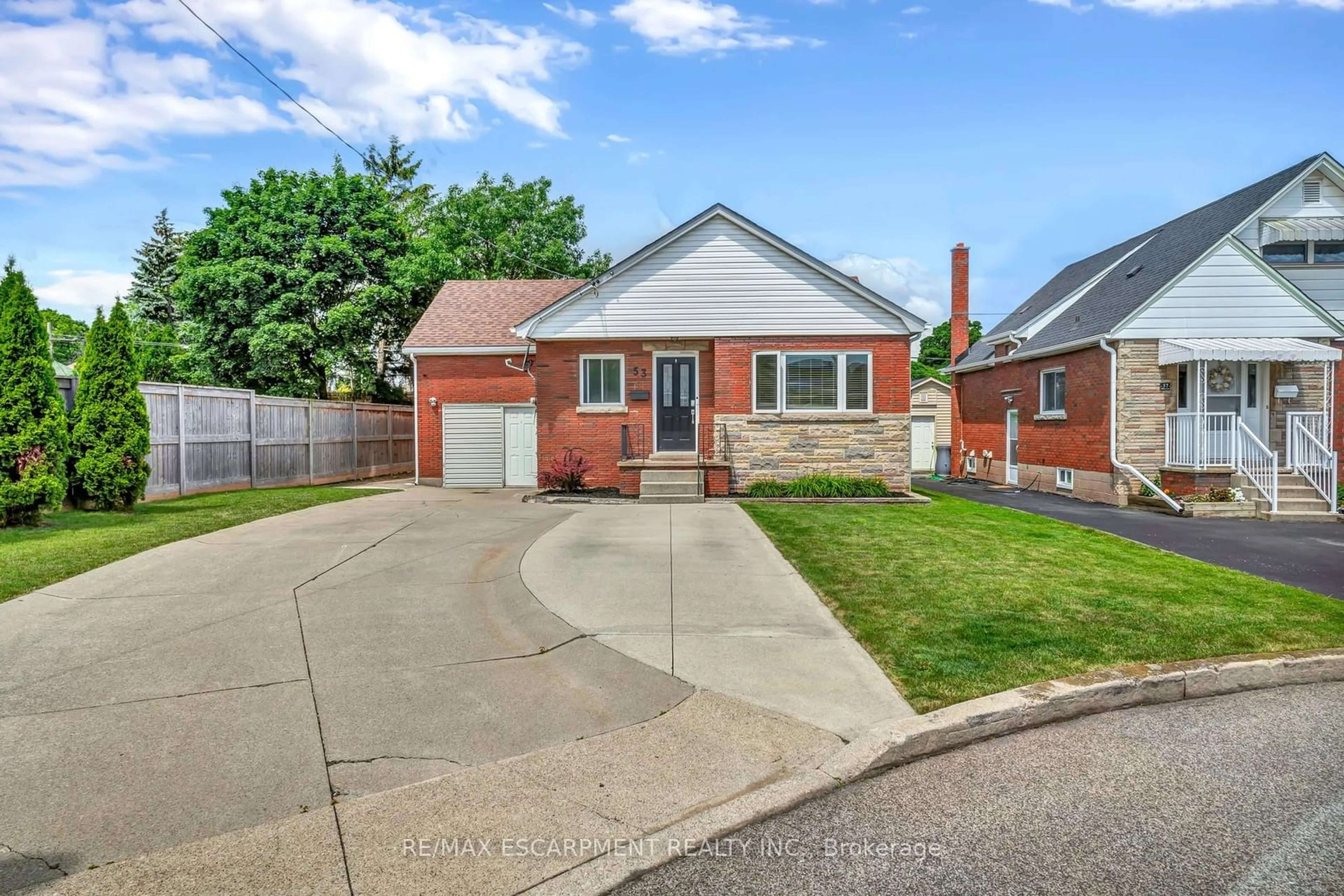 Frontside or backside of a home, the street view for 53 Paling Crt, Hamilton Ontario L8H 5J3