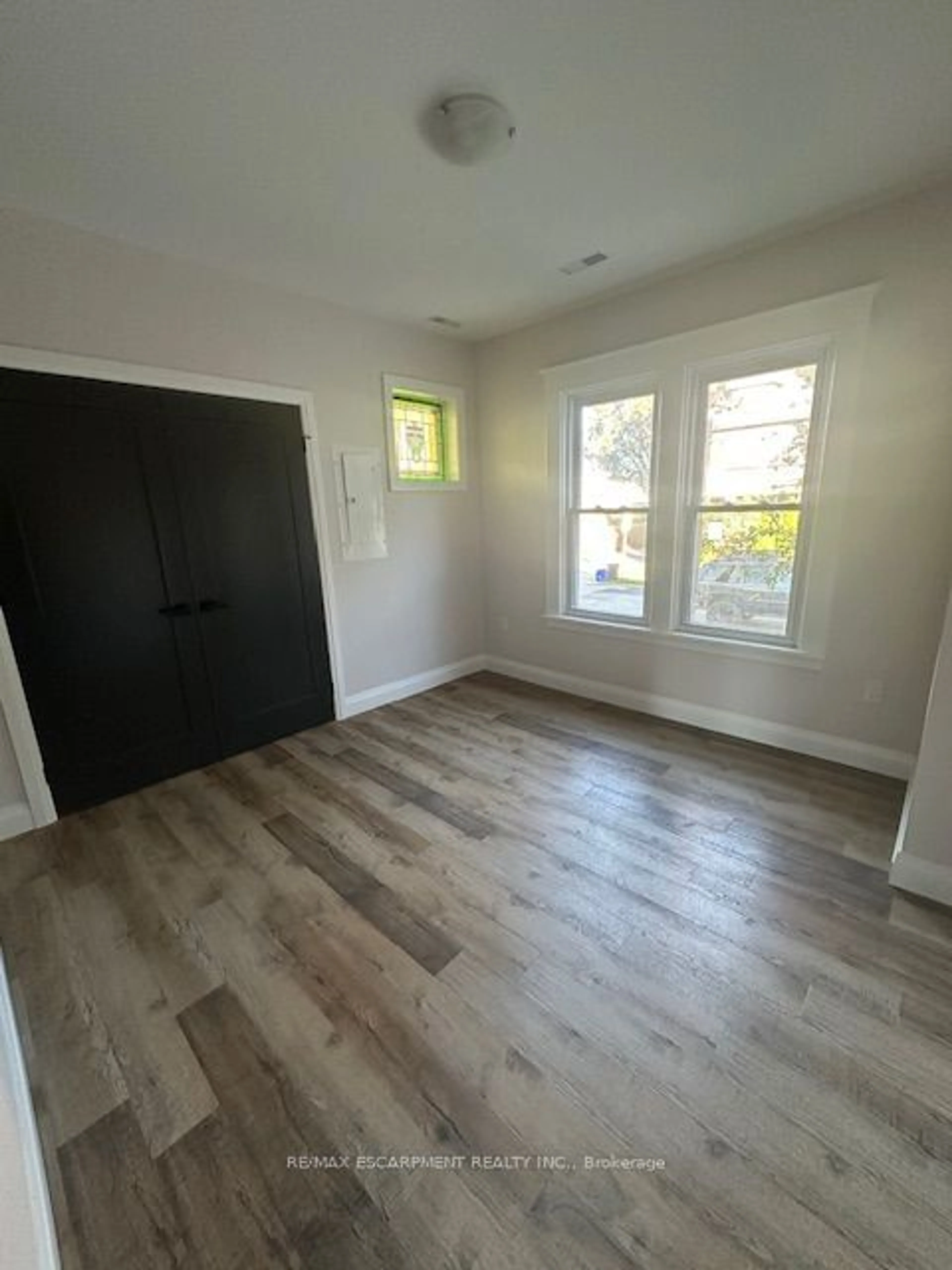 A pic of a room, wood floors for 14 BURRIS St, Hamilton Ontario L8M 2J2