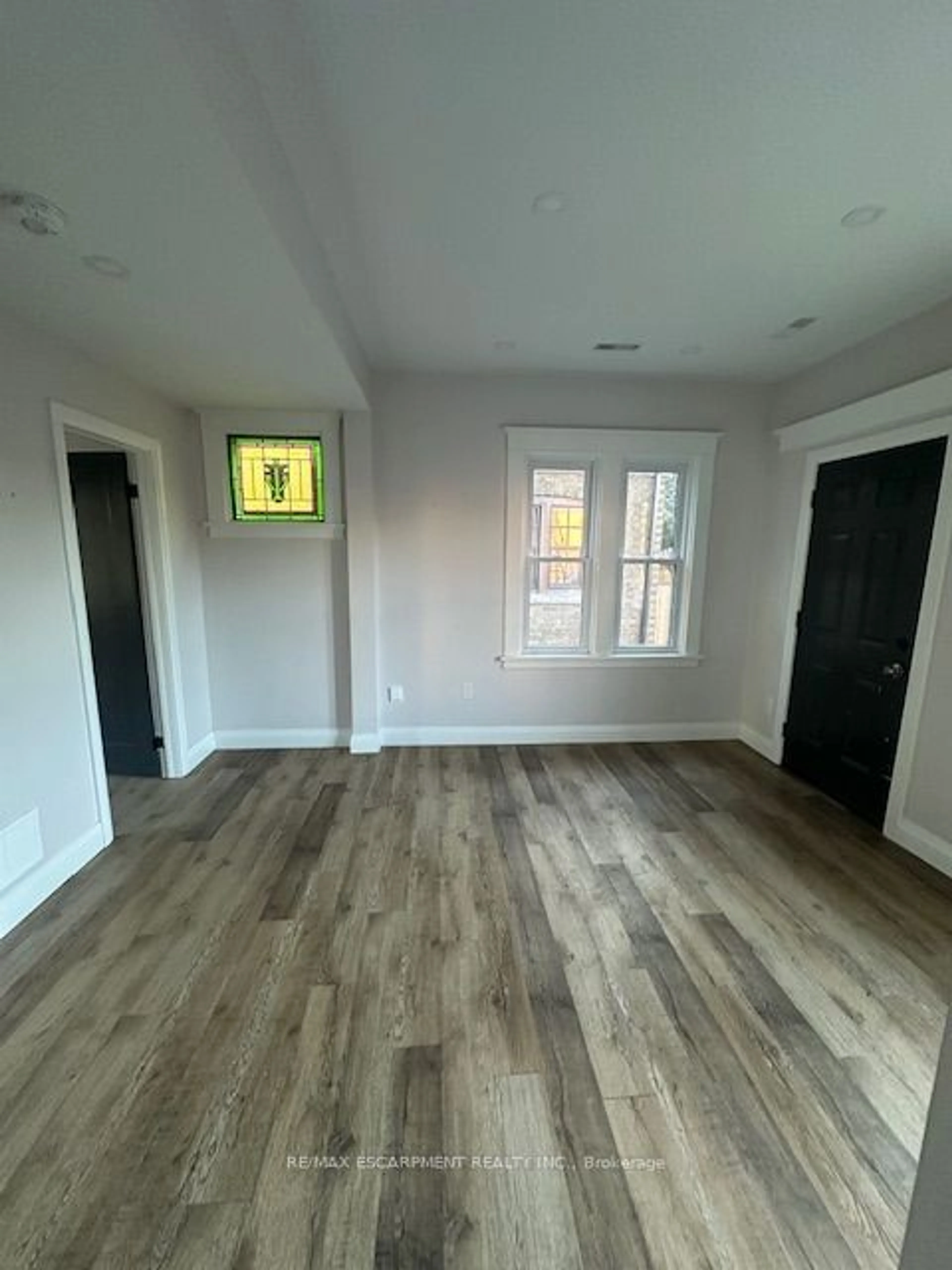 A pic of a room, wood floors for 14 BURRIS St, Hamilton Ontario L8M 2J2