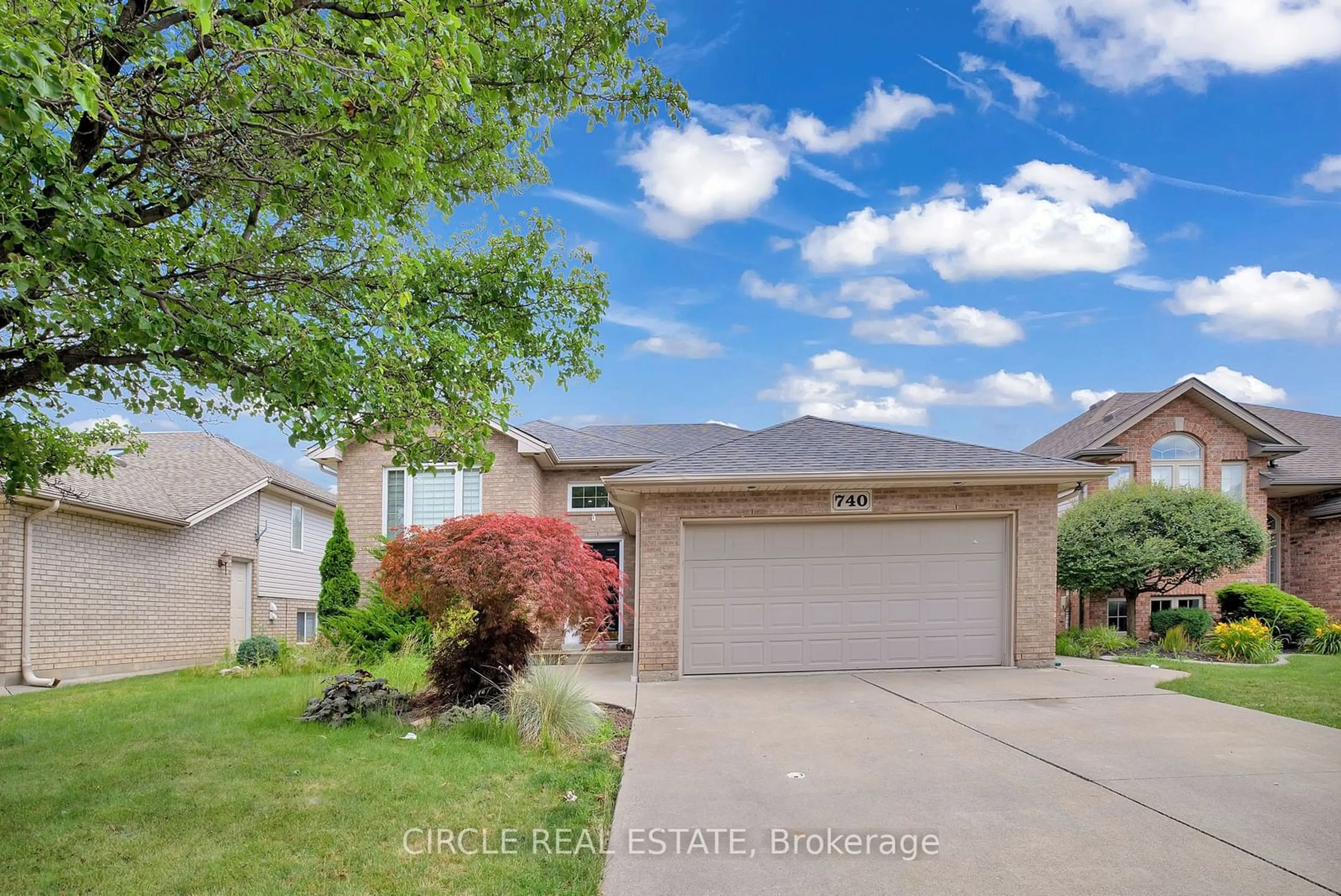 Frontside or backside of a home, the street view for 740 Revland Dr, Tecumseh Ontario N8N 5B2