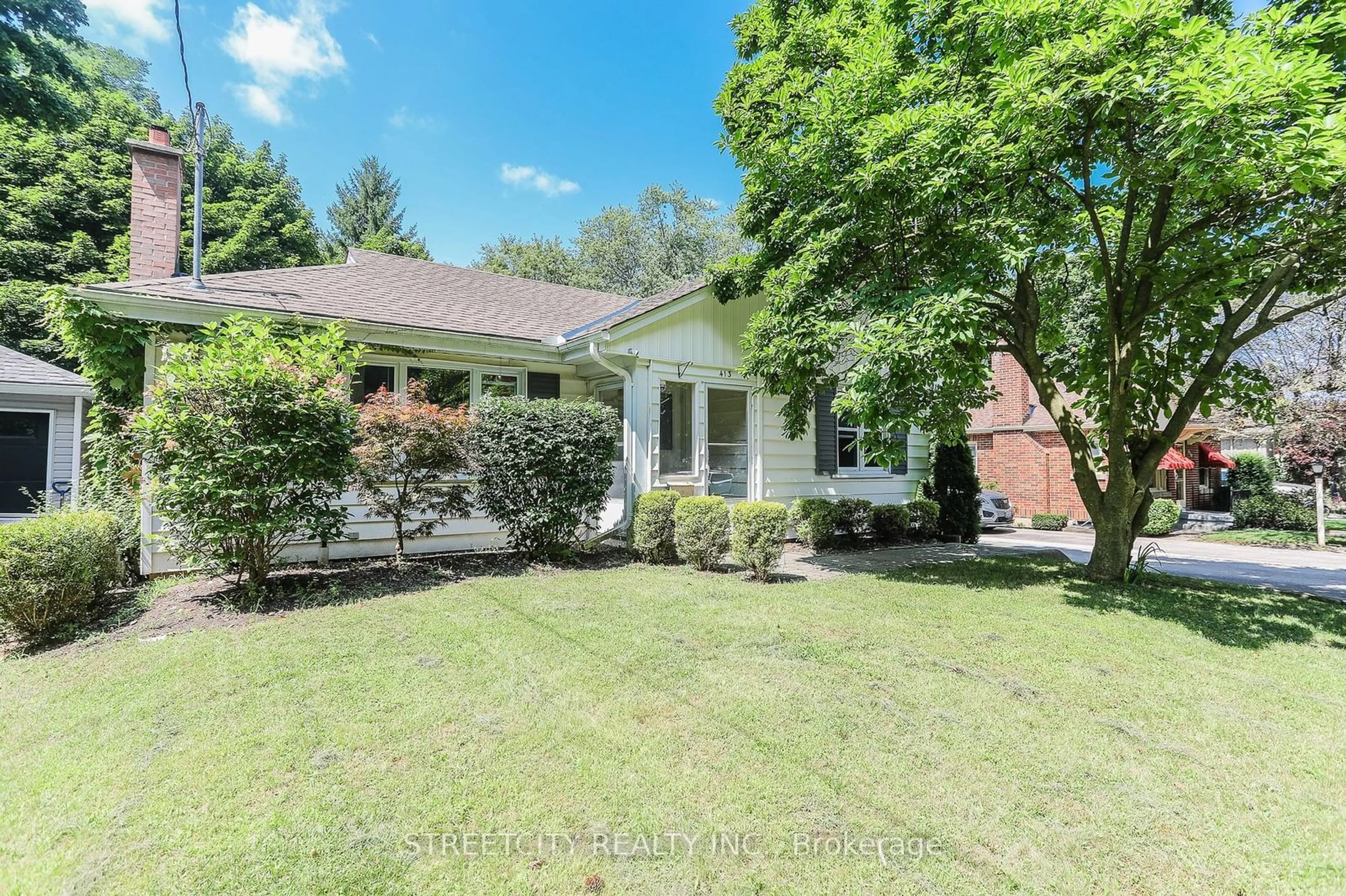 Frontside or backside of a home, the fenced backyard for 413 Byron Blvd, London Ontario N6K 2L6