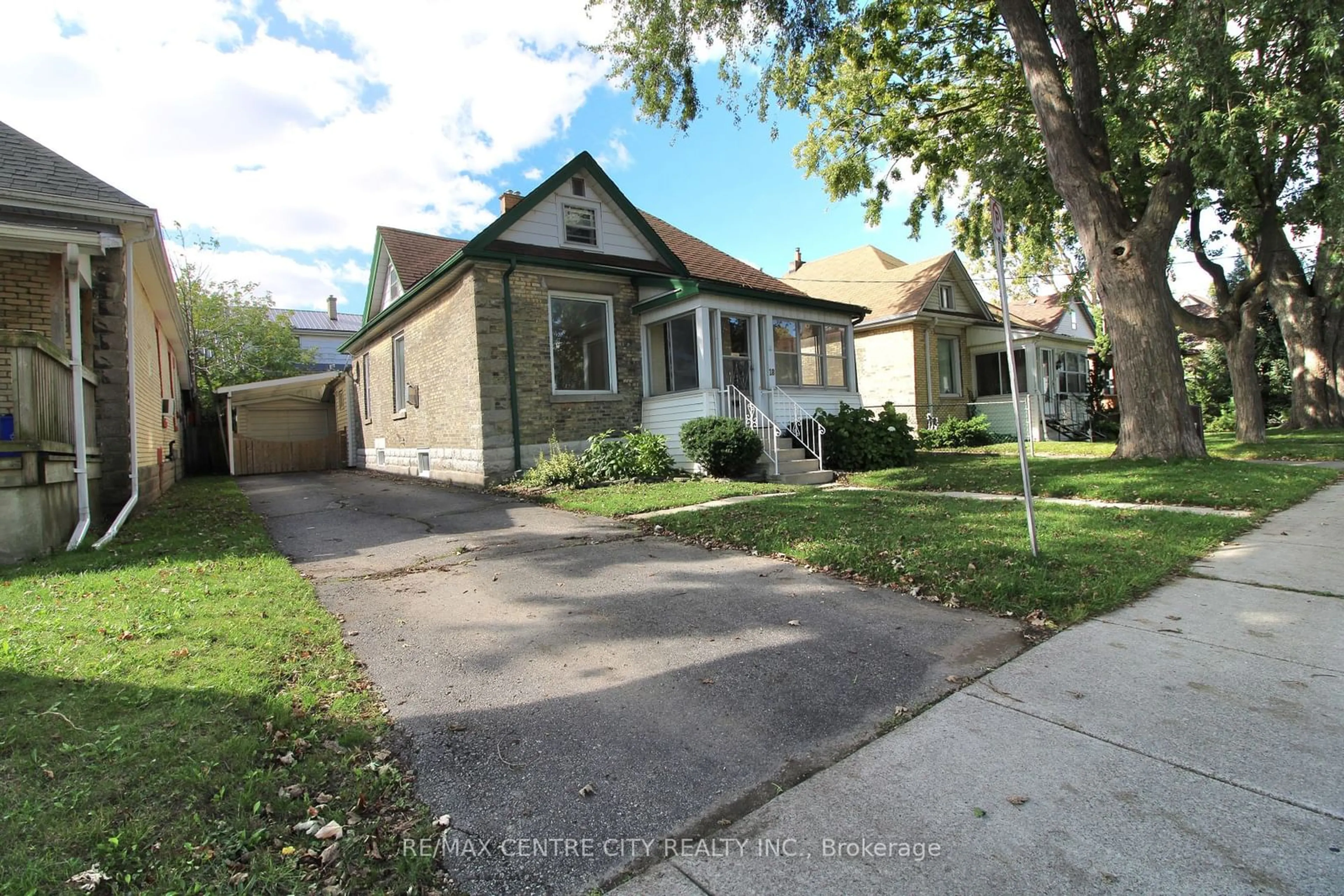 Frontside or backside of a home, the street view for 18 Woodworth Ave, St. Thomas Ontario N5P 3J4