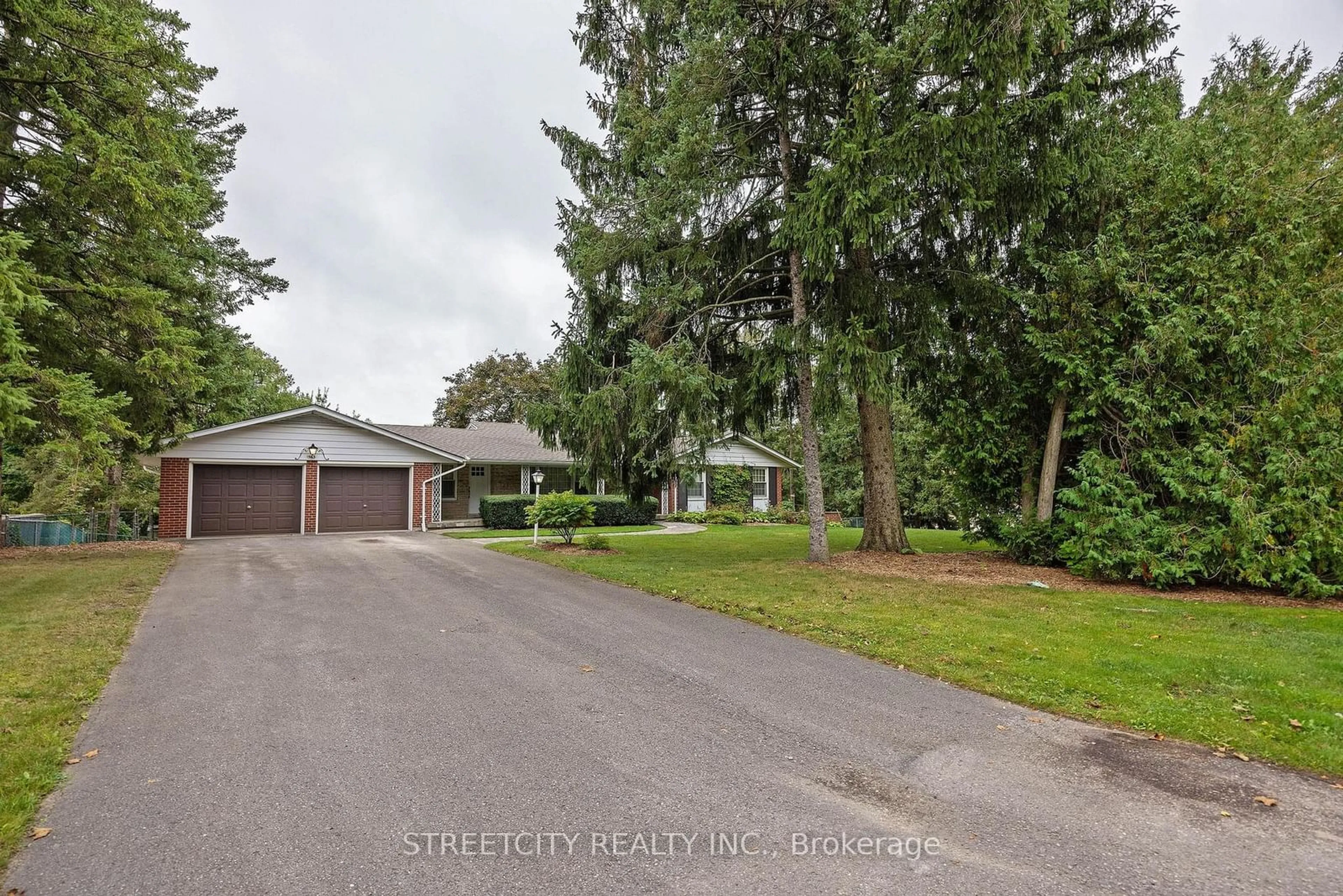 Frontside or backside of a home, the street view for 1563 McClure Dr, London Ontario N6G 2L1