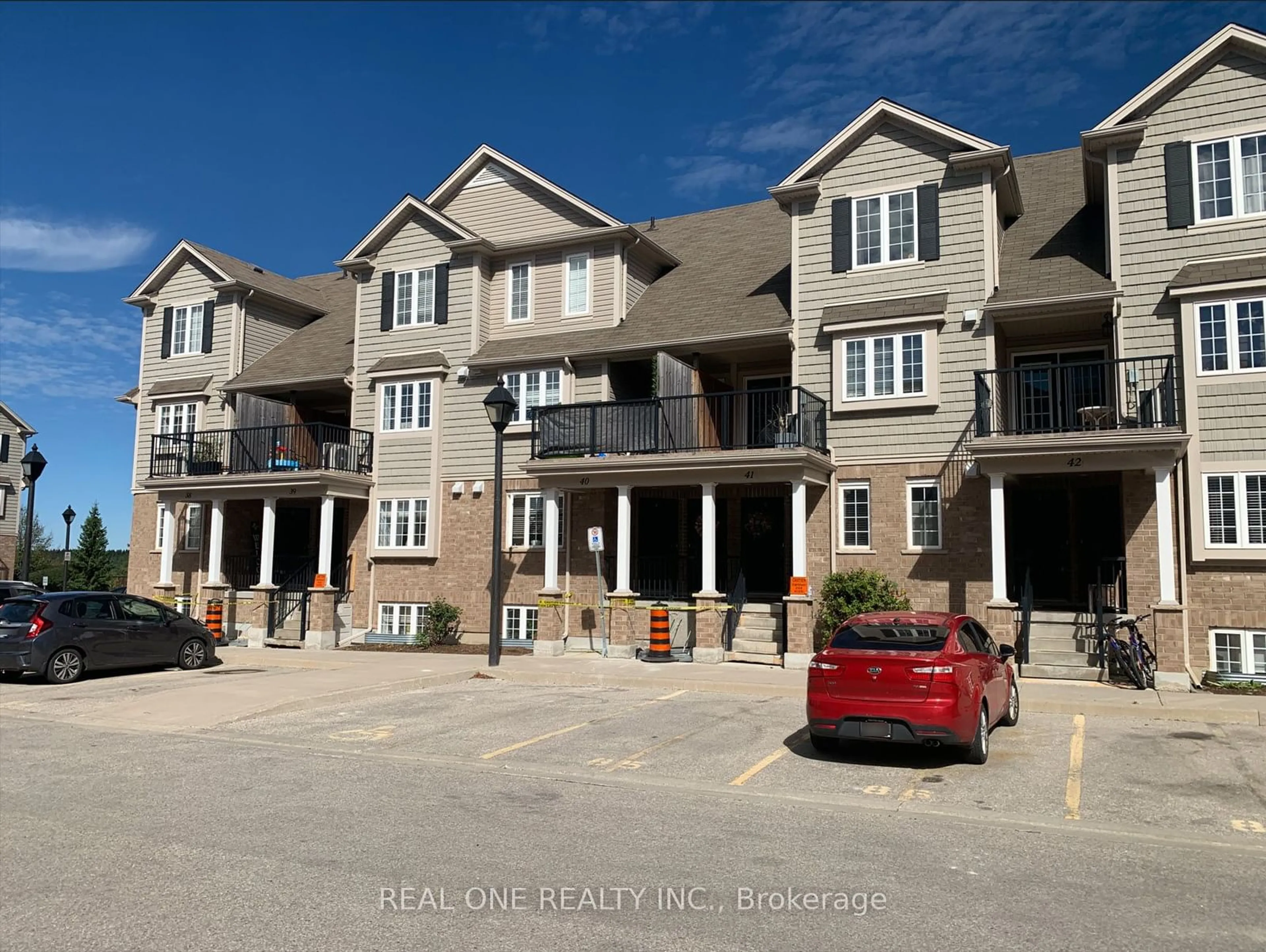 A pic from exterior of the house or condo, the street view for 15 Carere Cres #40A, Guelph Ontario N1E 0K4