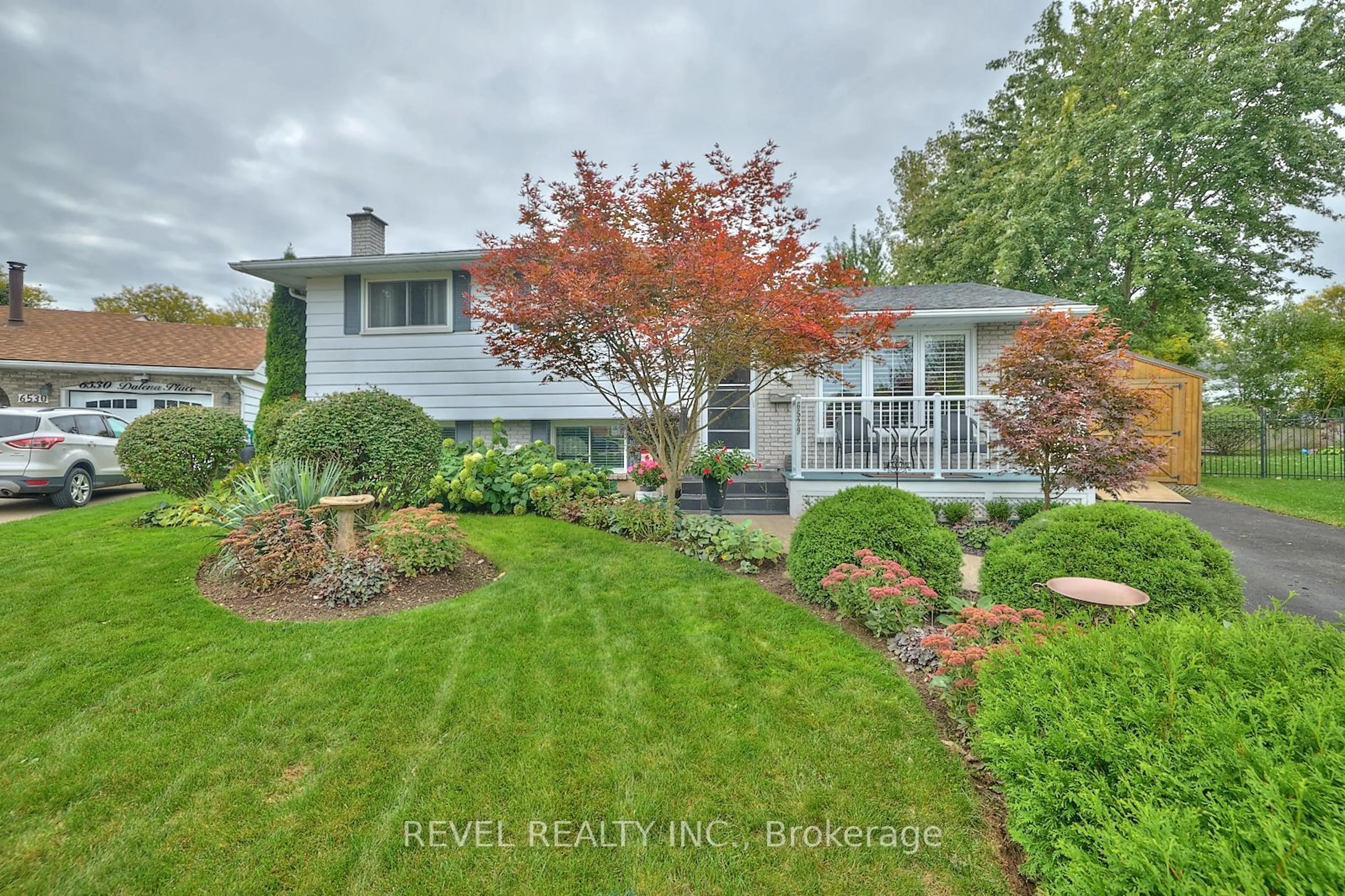 A pic from exterior of the house or condo, the fenced backyard for 6529 Dalena Pl, Niagara Falls Ontario L2H 1Z5