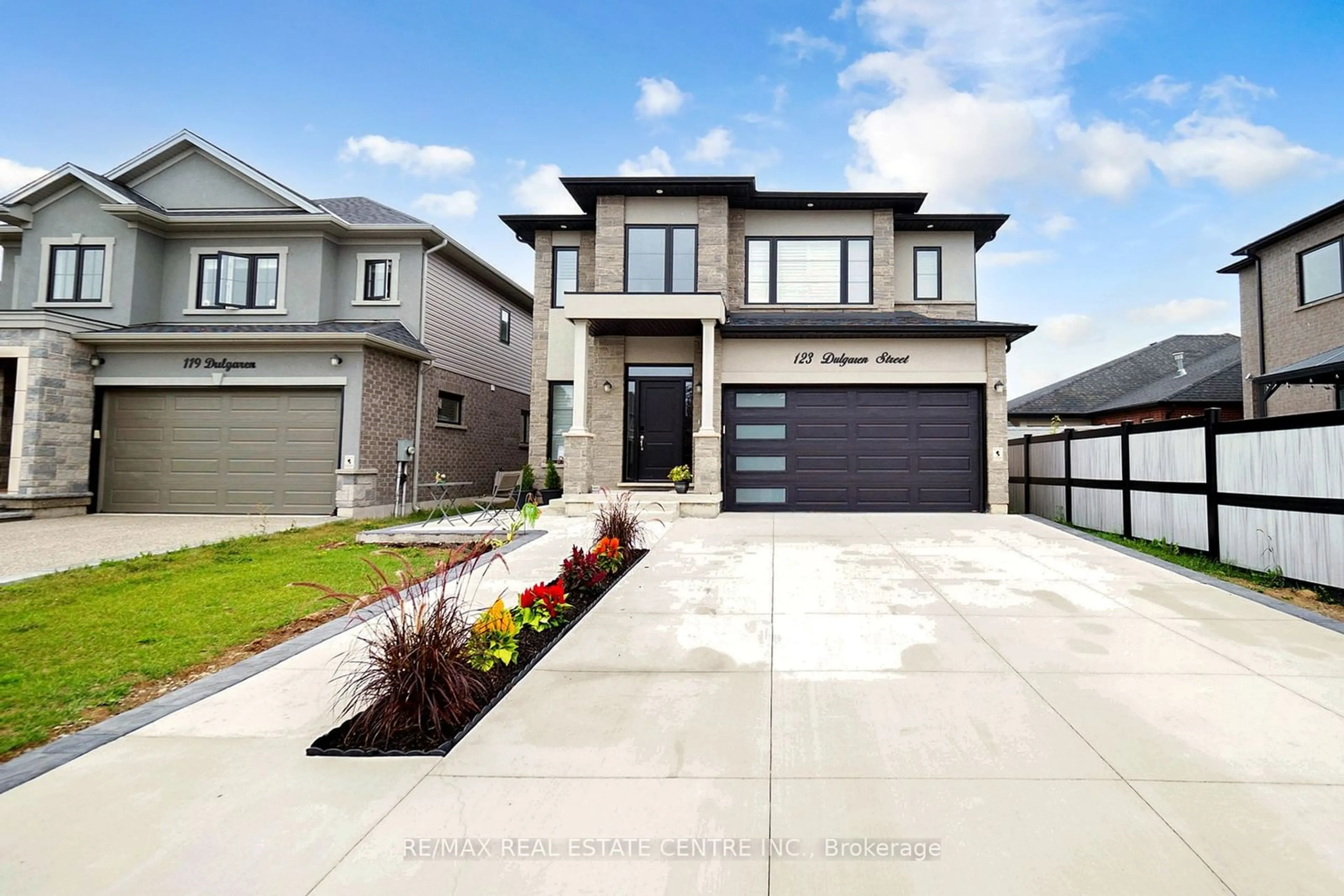 Frontside or backside of a home, the street view for 123 Dulgaren St, Hamilton Ontario L8W 3J5