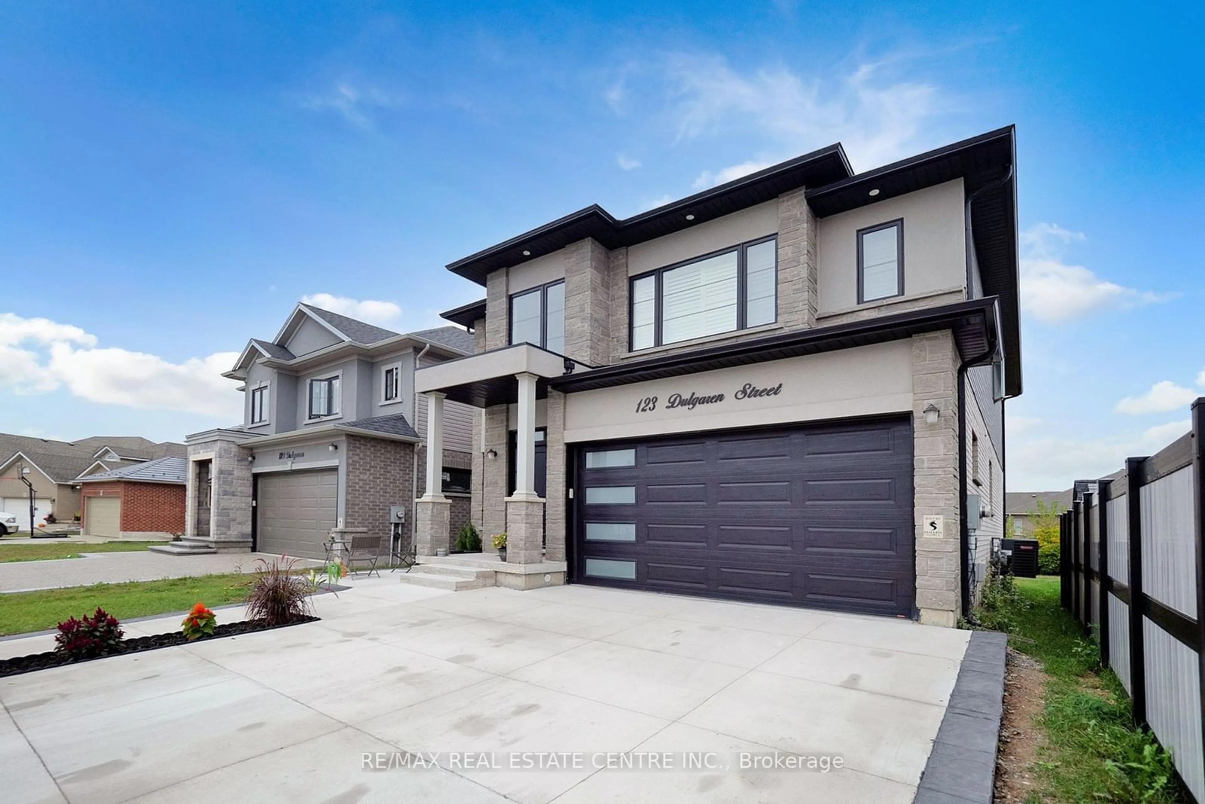 Frontside or backside of a home, the street view for 123 Dulgaren St, Hamilton Ontario L8W 3J5