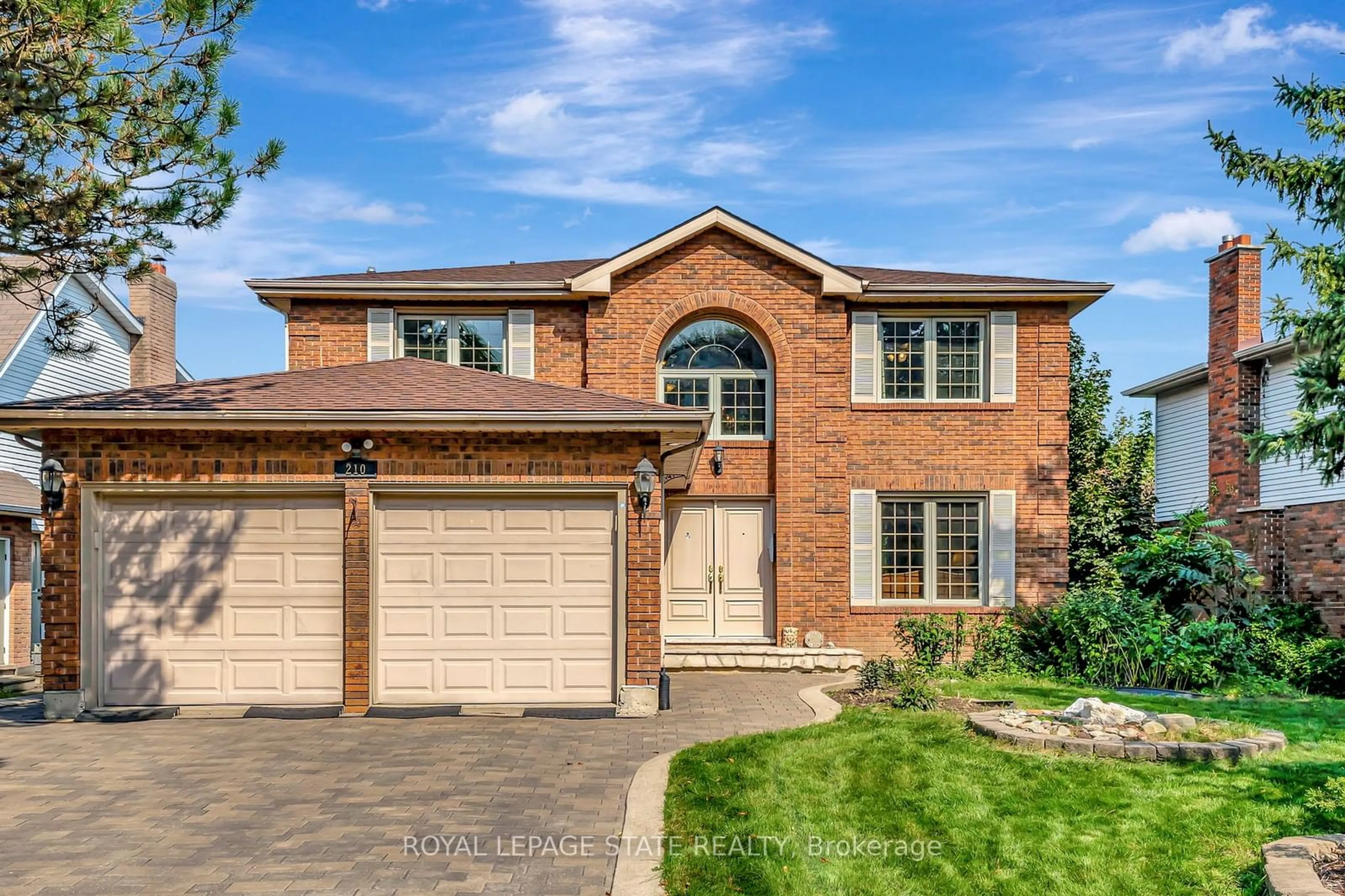 Home with brick exterior material for 210 Bluebell Cres, Hamilton Ontario L9K 1B9