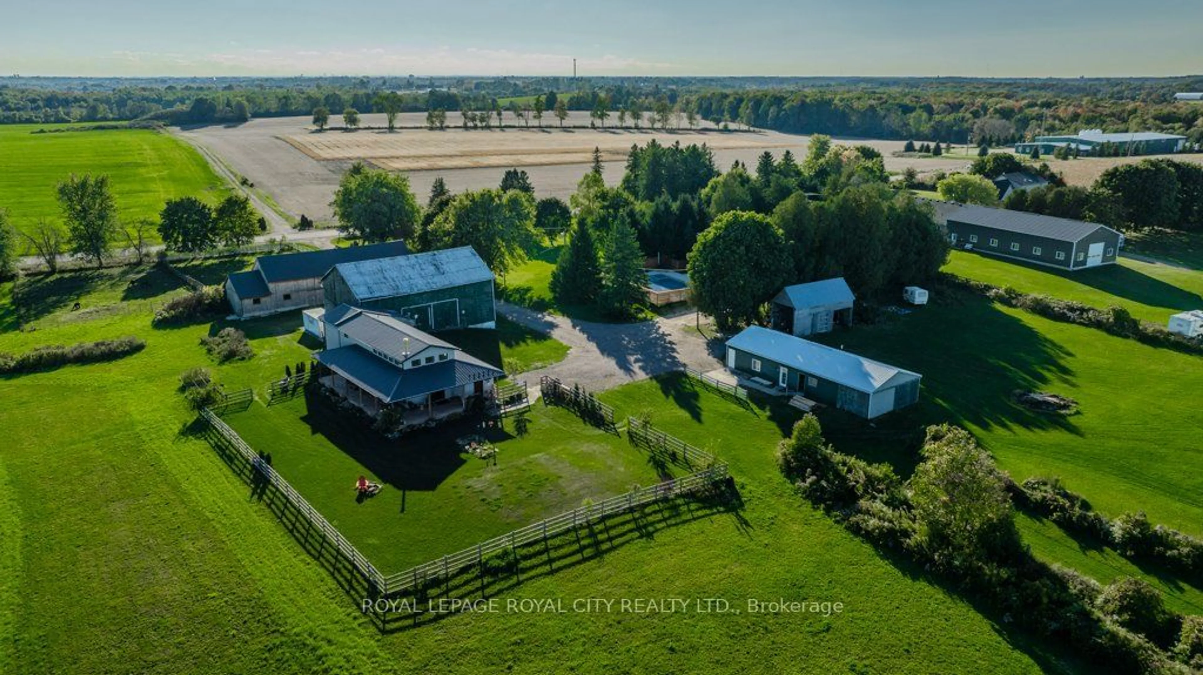 A pic from exterior of the house or condo, the fenced backyard for 5161 Jones Baseline Rd, Guelph/Eramosa Ontario N1H 6H8