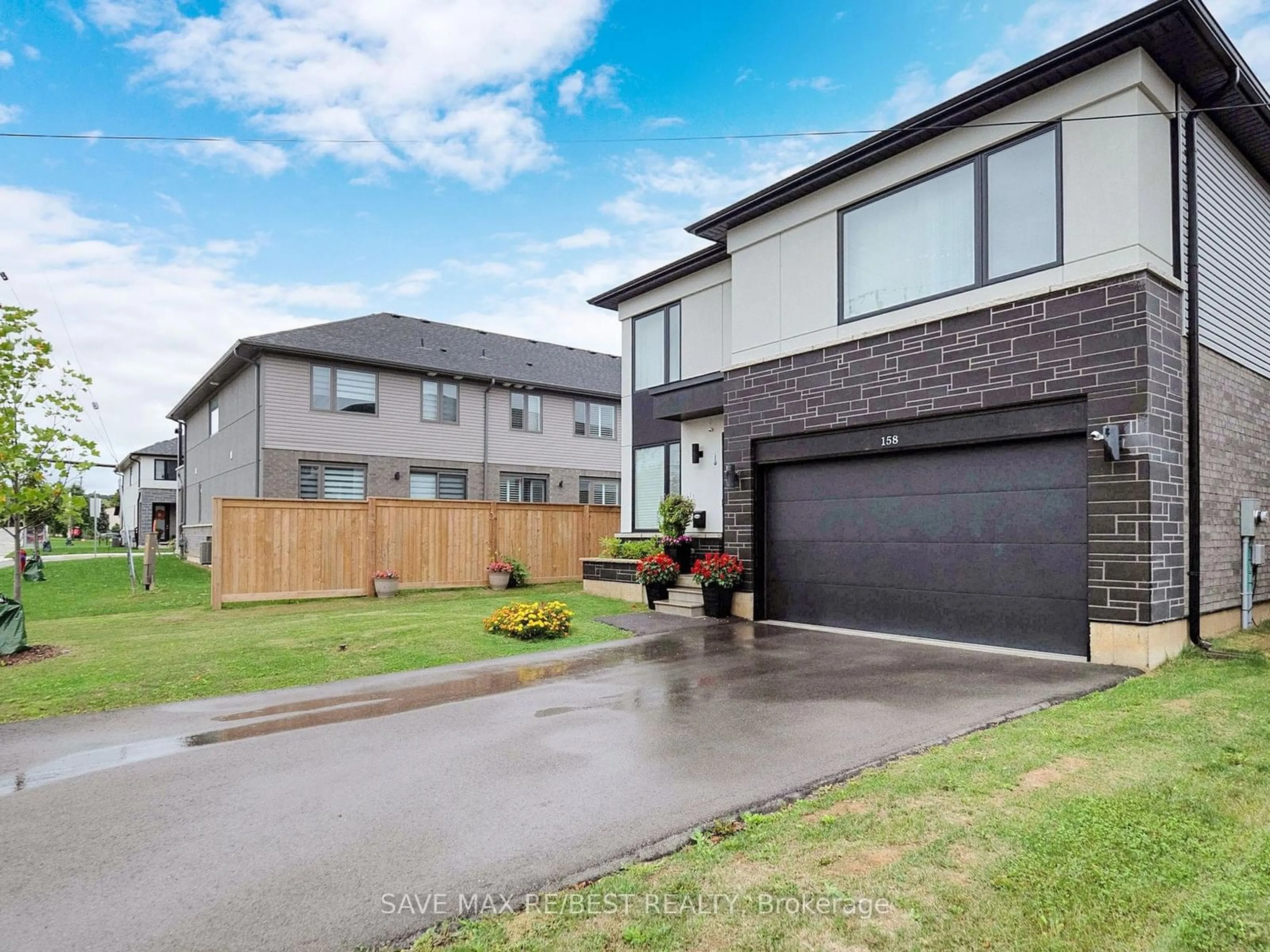 Frontside or backside of a home, the fenced backyard for 158 Mount Albion Rd, Hamilton Ontario L8K 5S8