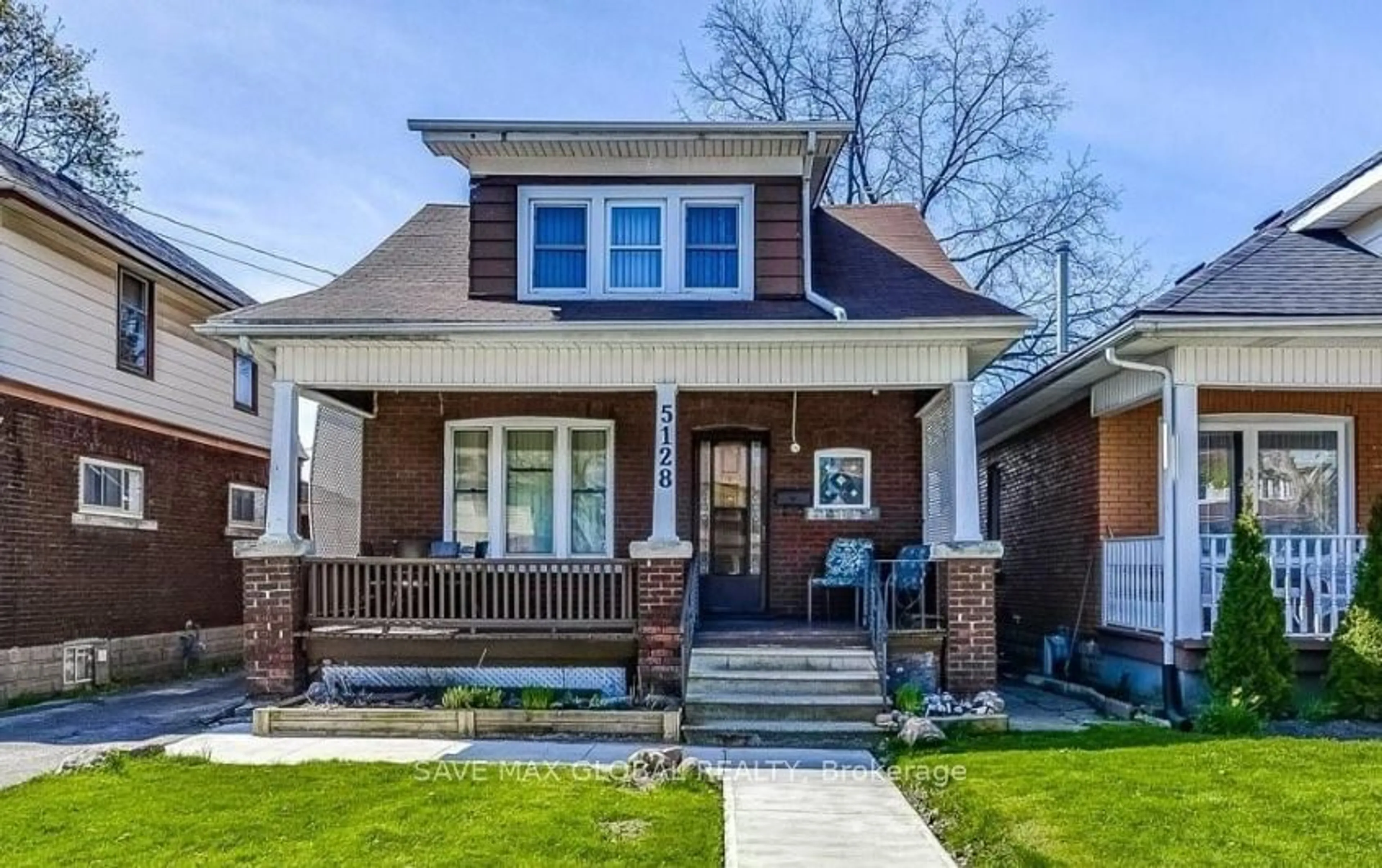 Home with brick exterior material for 5128 Willmott St, Niagara Falls Ontario L2E 2A3