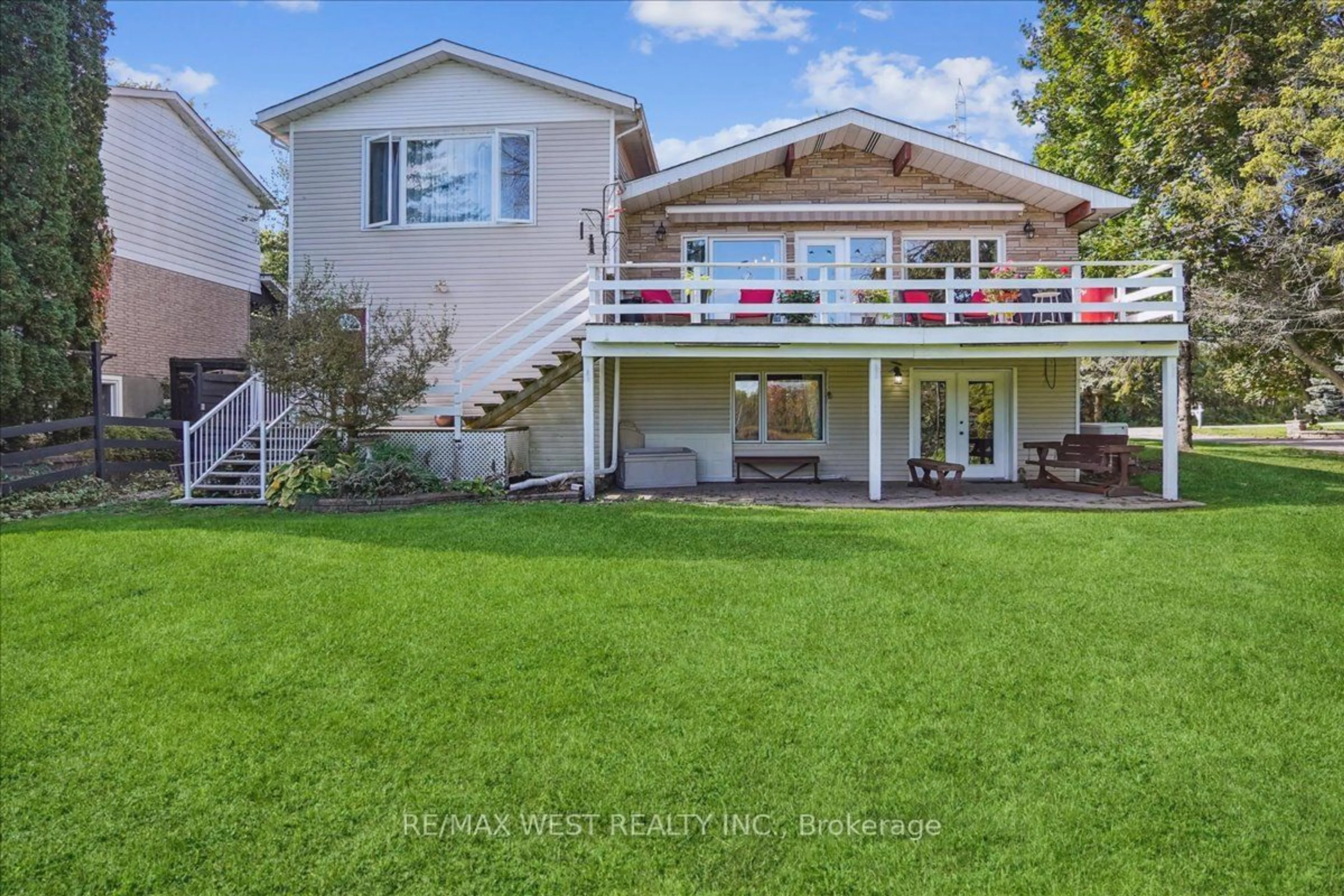 Frontside or backside of a home, the fenced backyard for 20855 Brunon Ave, Kawartha Lakes Ontario L0C 1G0