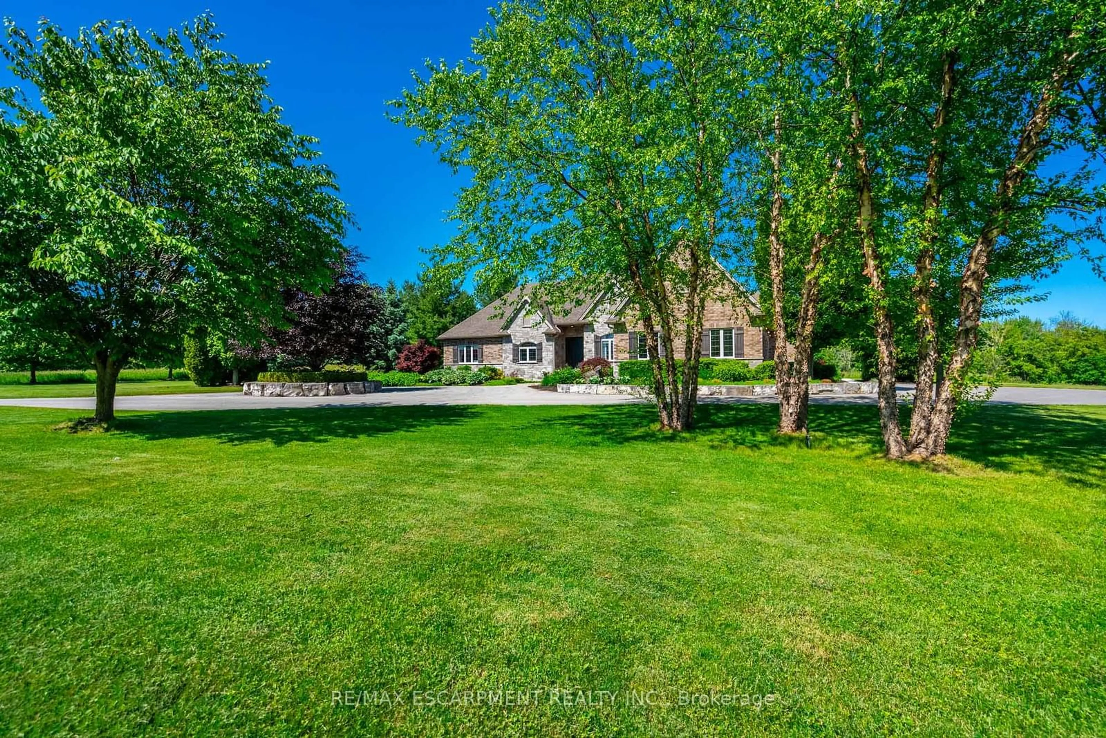 A pic from exterior of the house or condo, the fenced backyard for 1068 Wyatt Rd, Hamilton Ontario L8B 1A3