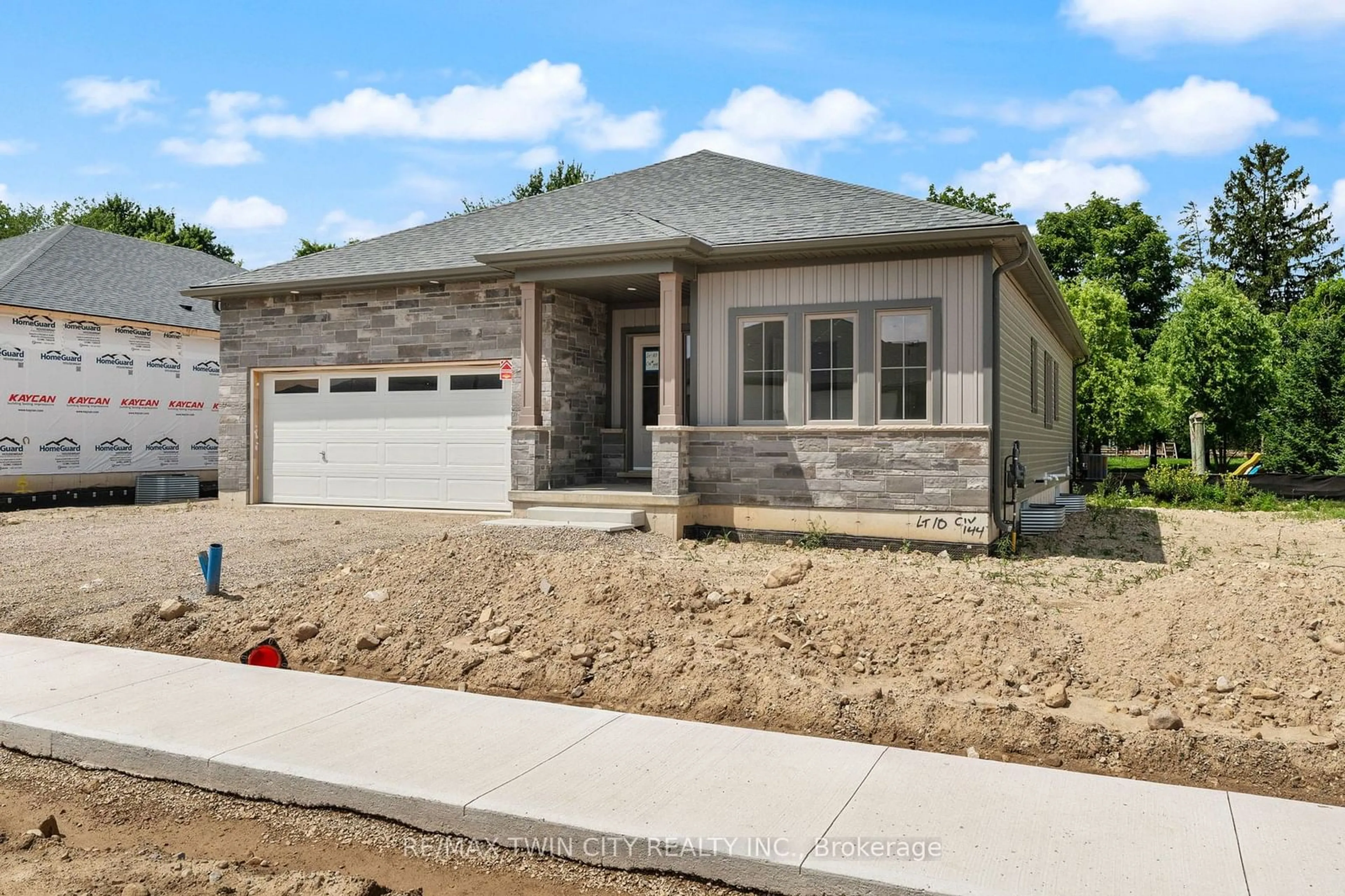 Frontside or backside of a home, the street view for 144 Ellen St, North Perth Ontario N0G 1B0